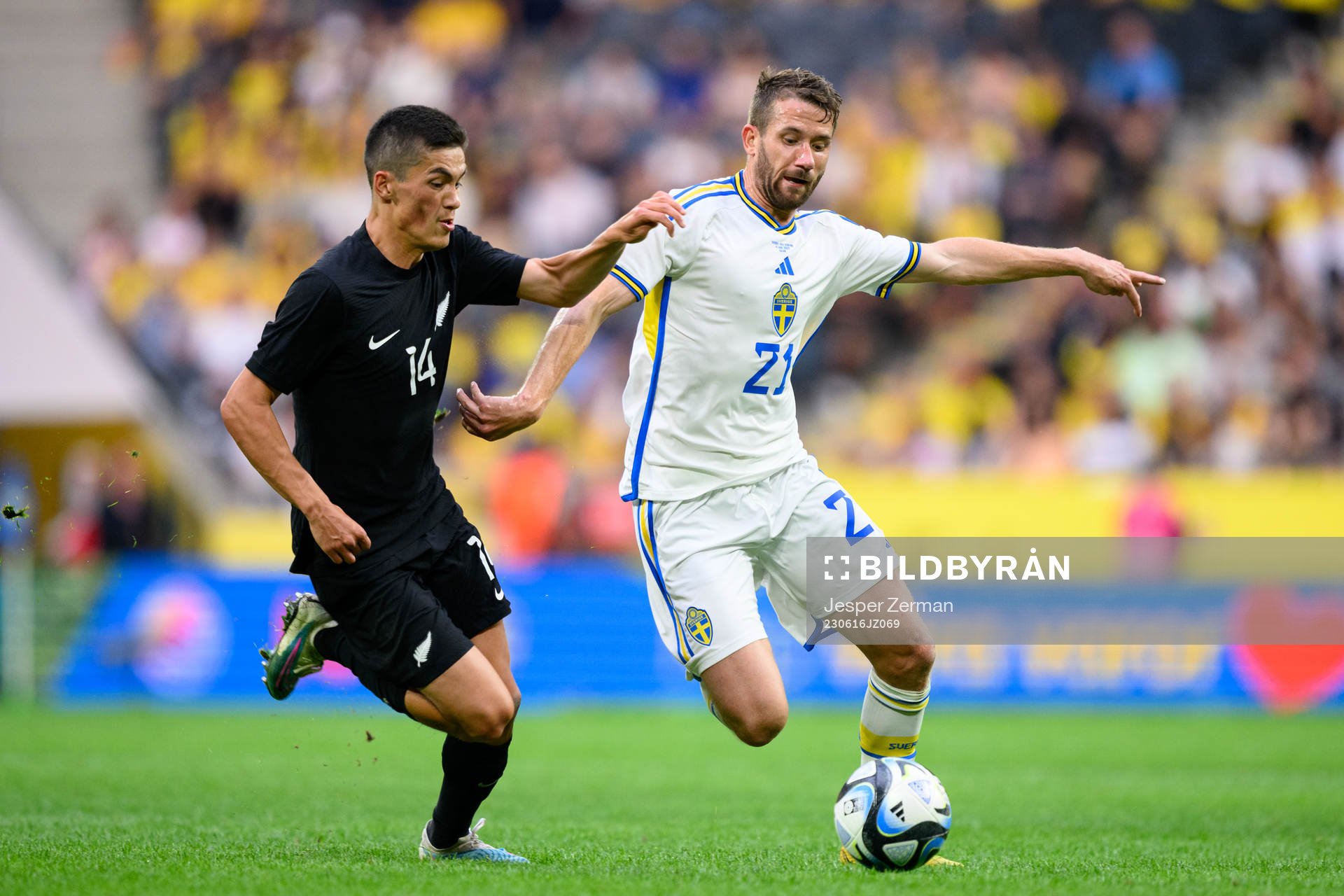 Elijah Just of New Zealand and Marcus Rohdén of Sweden during the international friendly football match between Sweden and New Zealand on June 16, 2023 in Stockholm.
