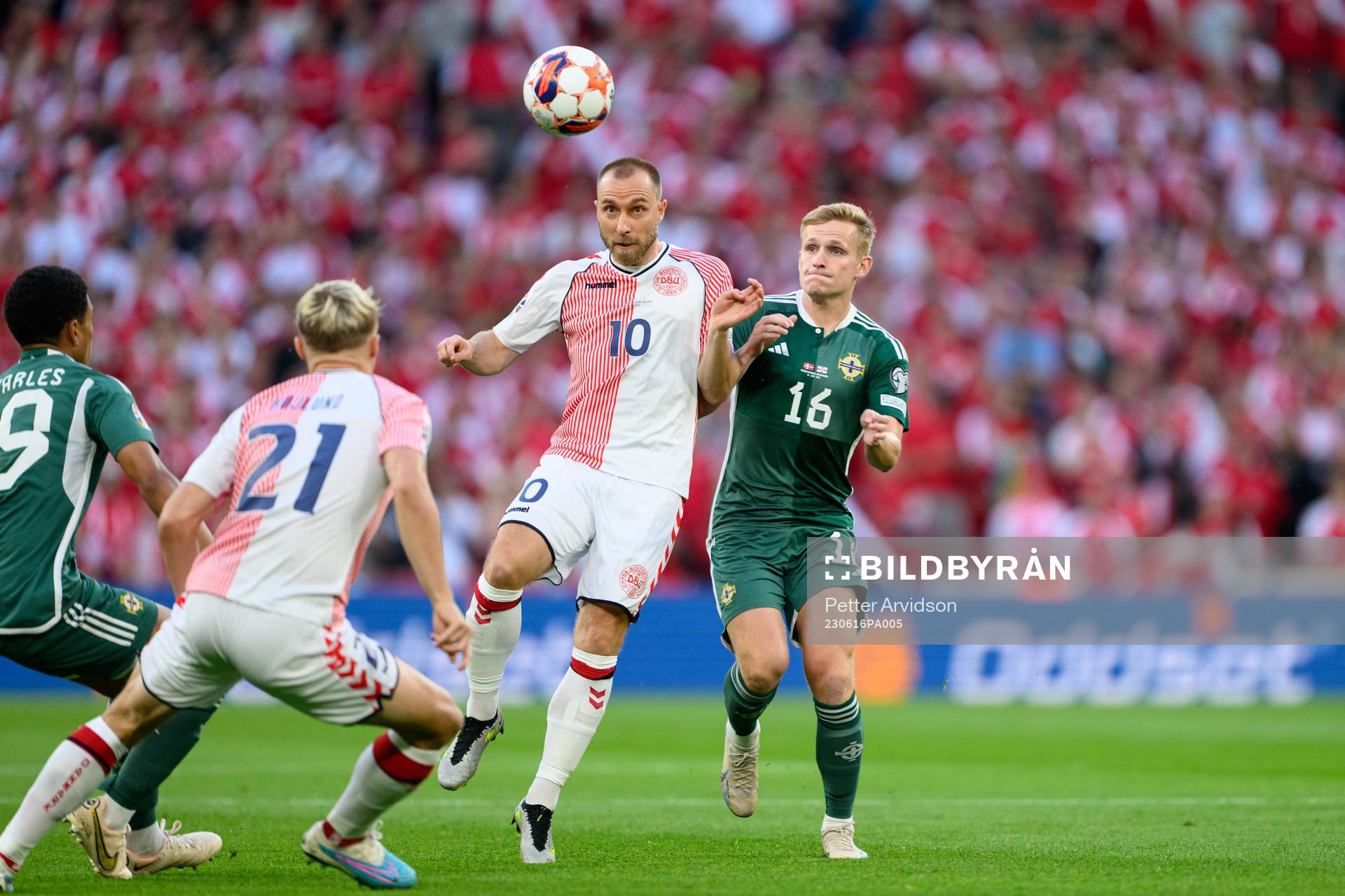 Christian Eriksen of Denmark and Alistair McCann of