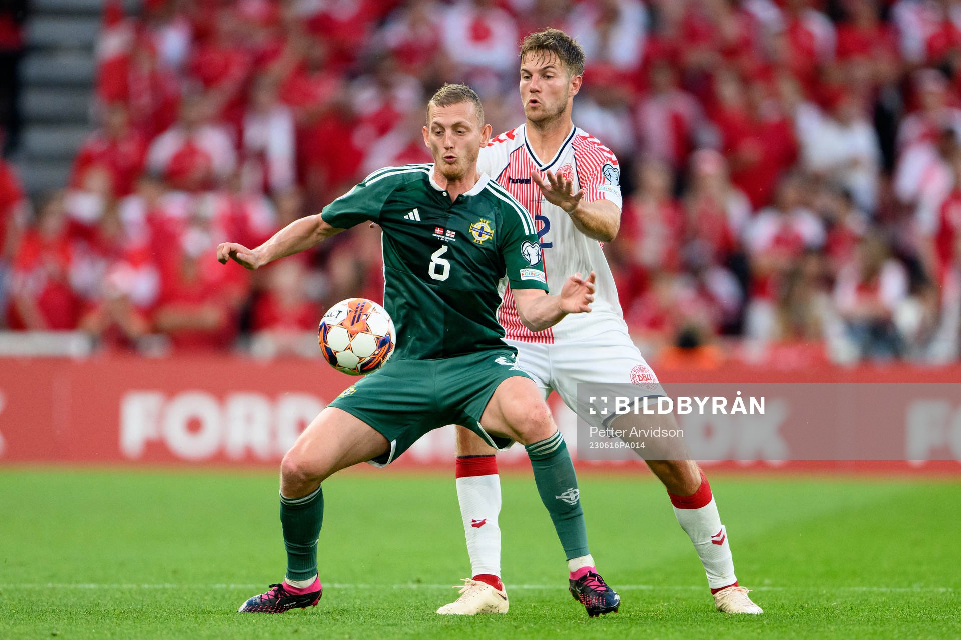 Jonny Evans of Northern Ireland and Joachim Andersen of
