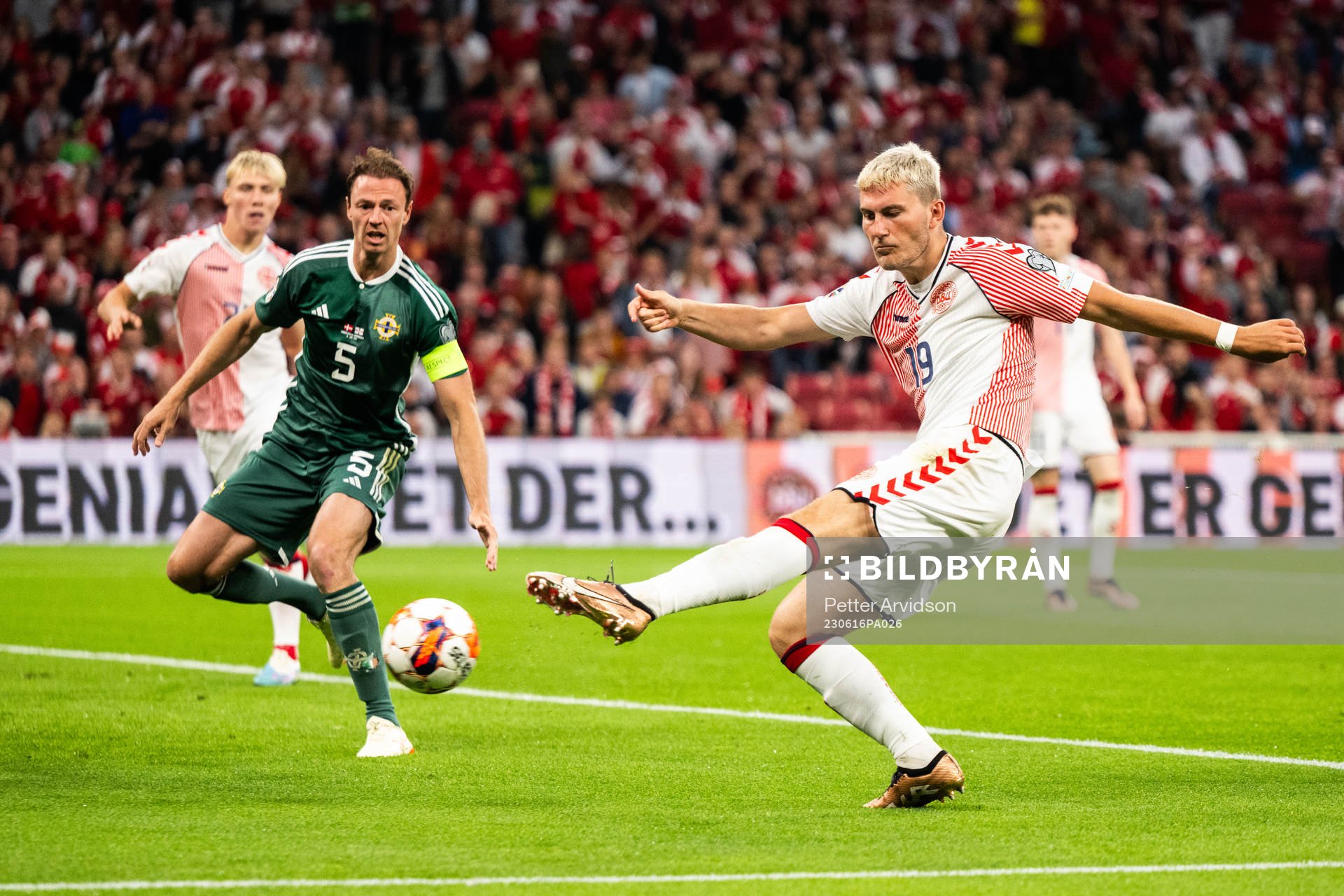 Jonas Wind of Denmark scores the 1-0 goal
