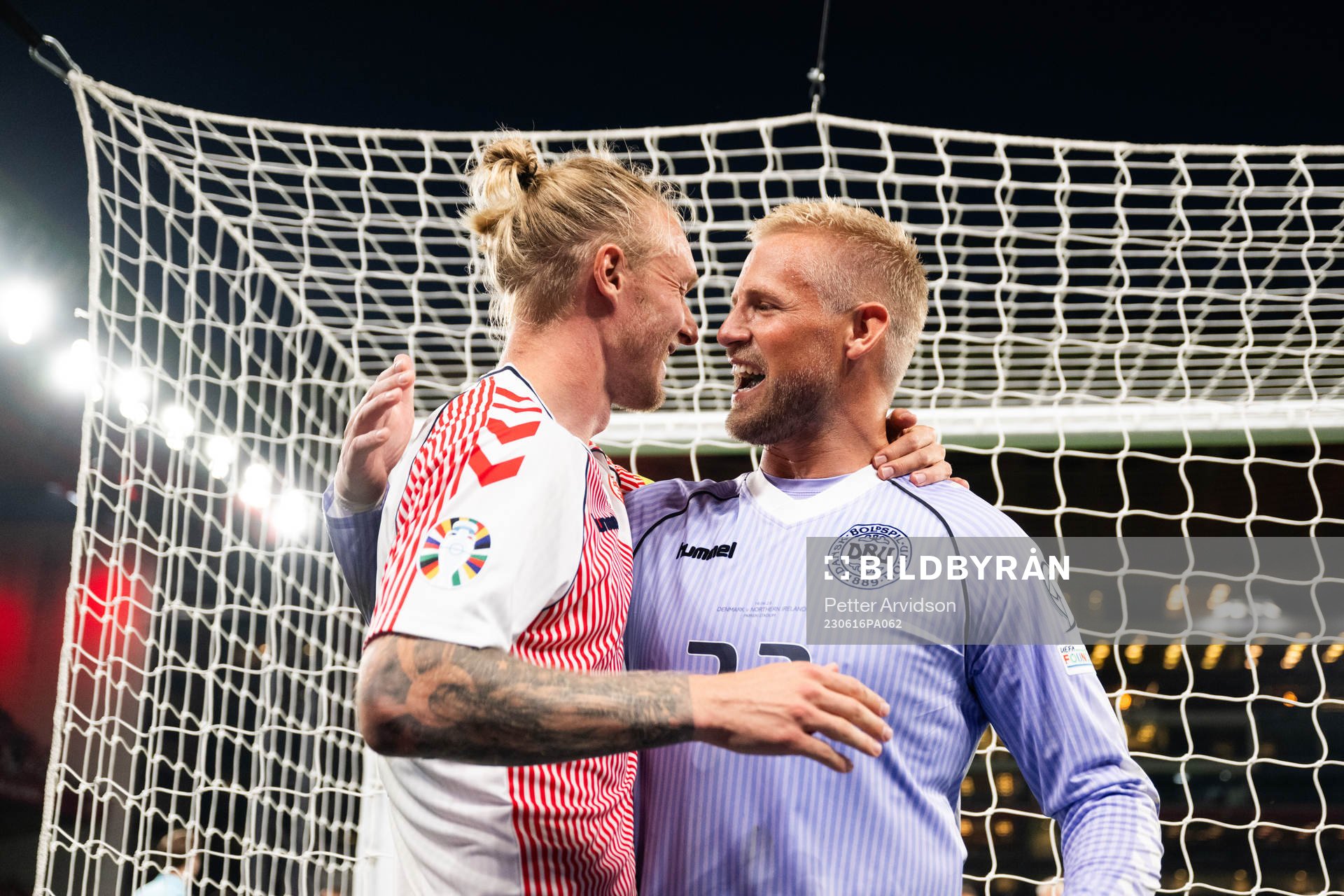 Simon Kjær and Goalkeeper Kasper Schmeichel of Denmark