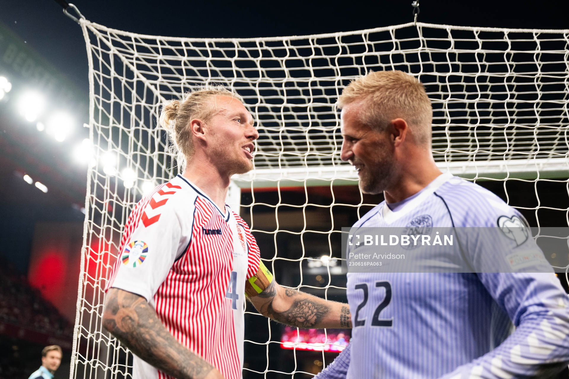 Simon Kjær and Goalkeeper Kasper Schmeichel of Denmark