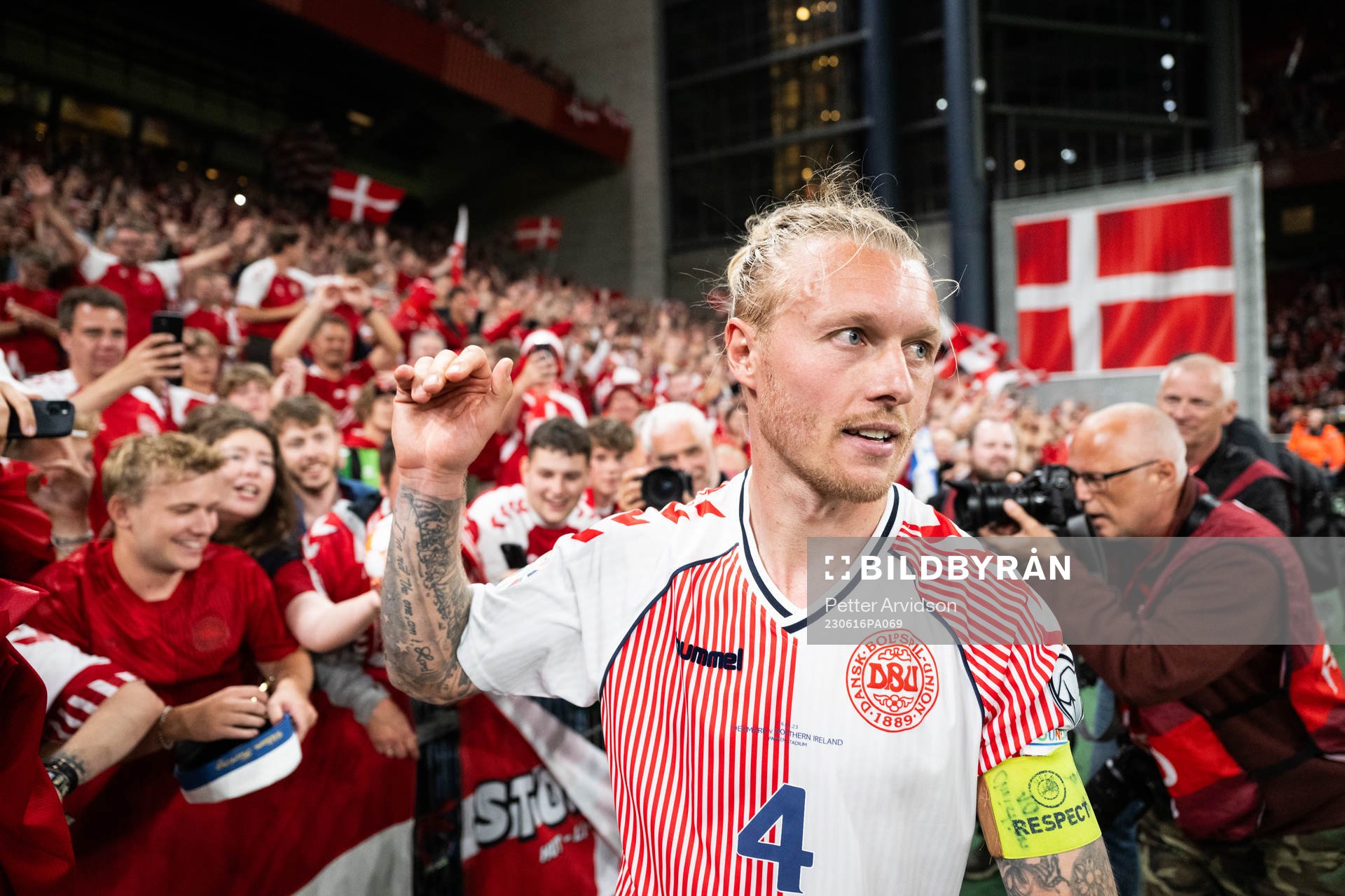 Simon Kjær of Denmark celebrates