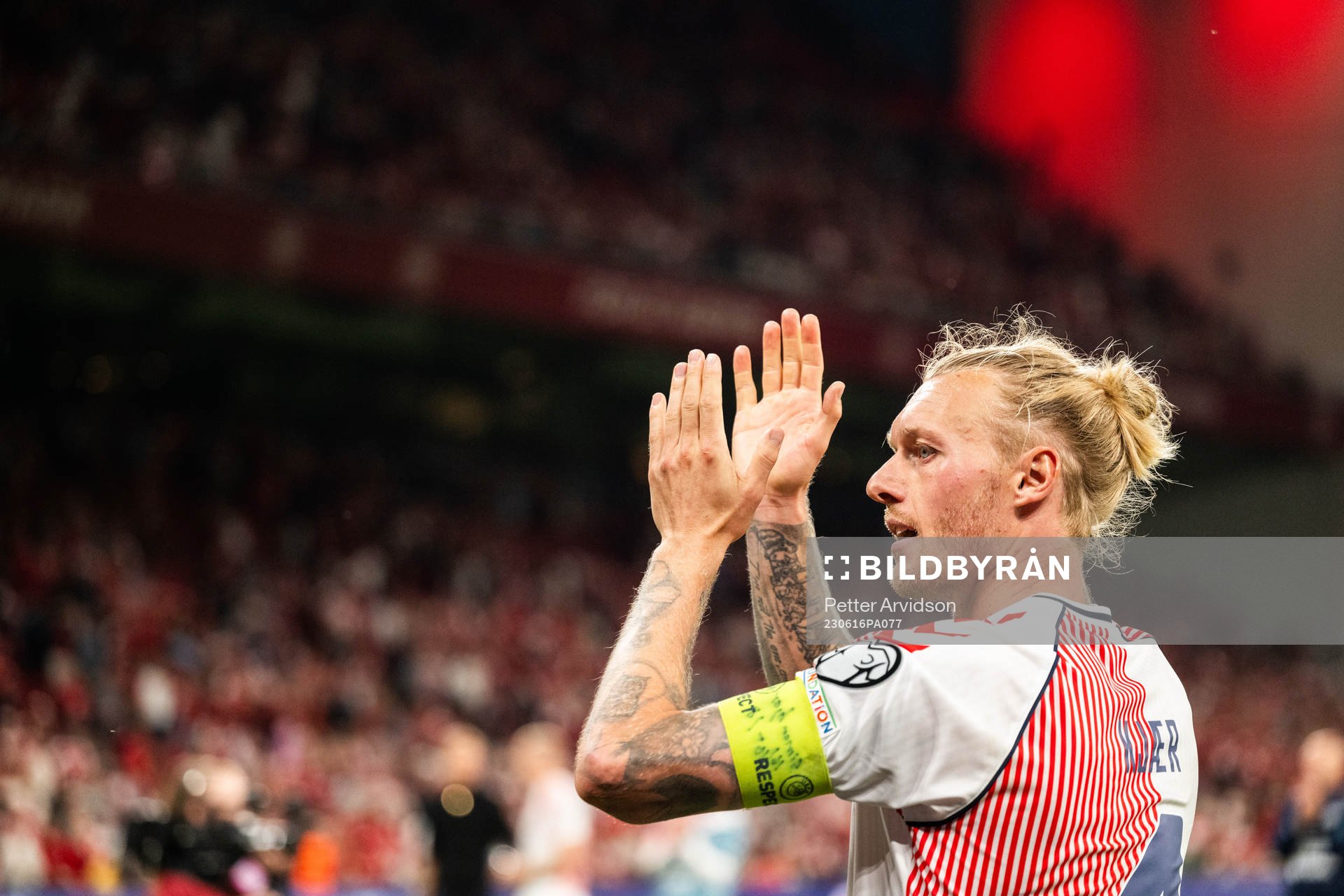 Simon Kjær of Denmark celebrates