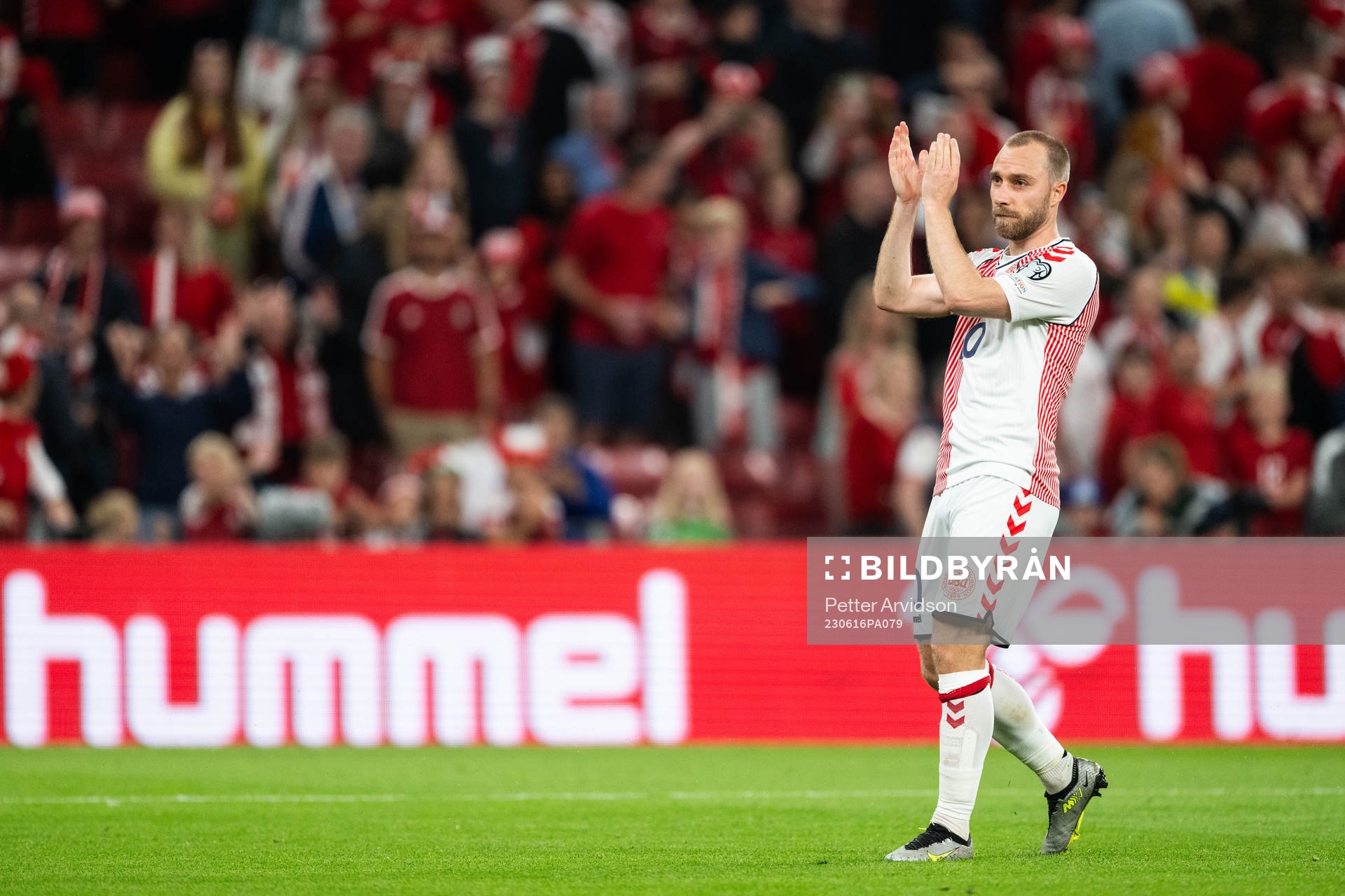 Christian Eriksen of Denmark celebrates
