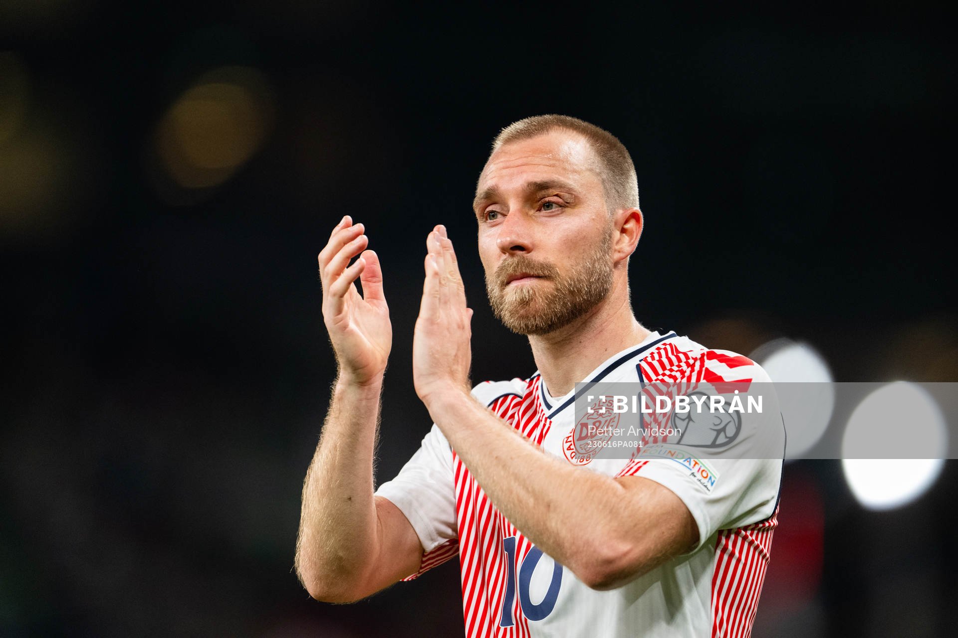Christian Eriksen of Denmark celebrates