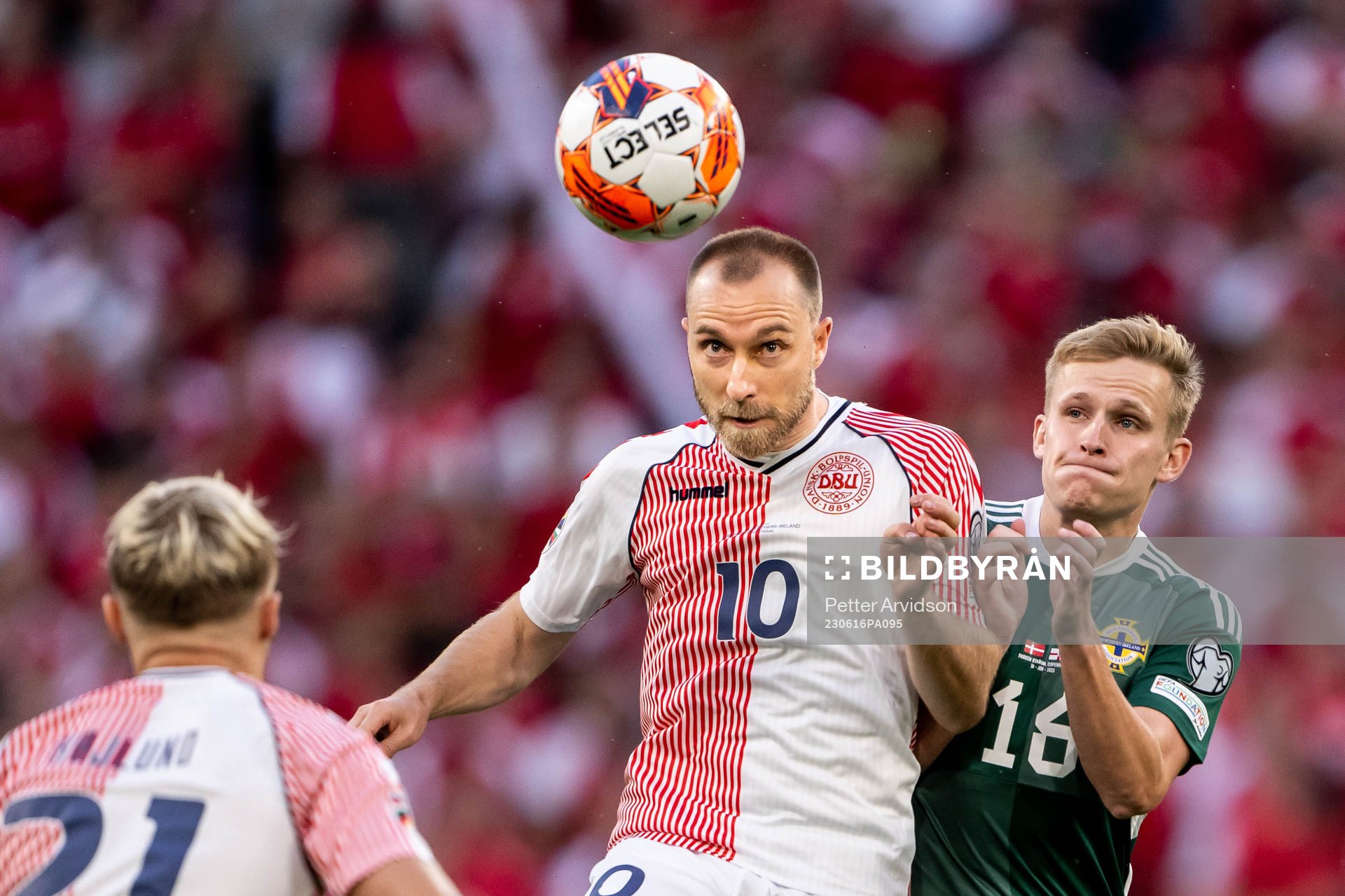 Christian Eriksen of Denmark and Alistair McCann of