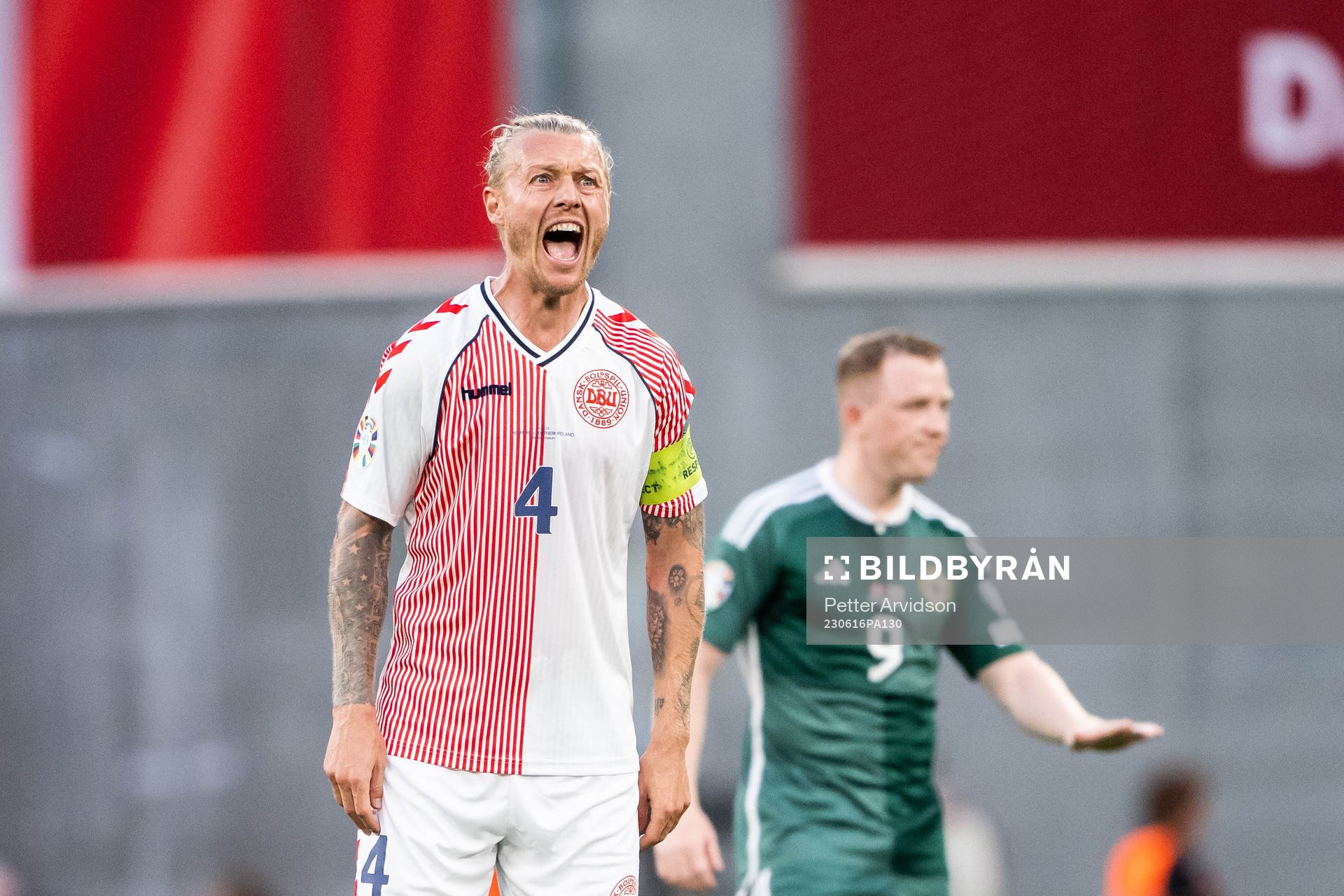 Simon Kjær of Denmark reacts