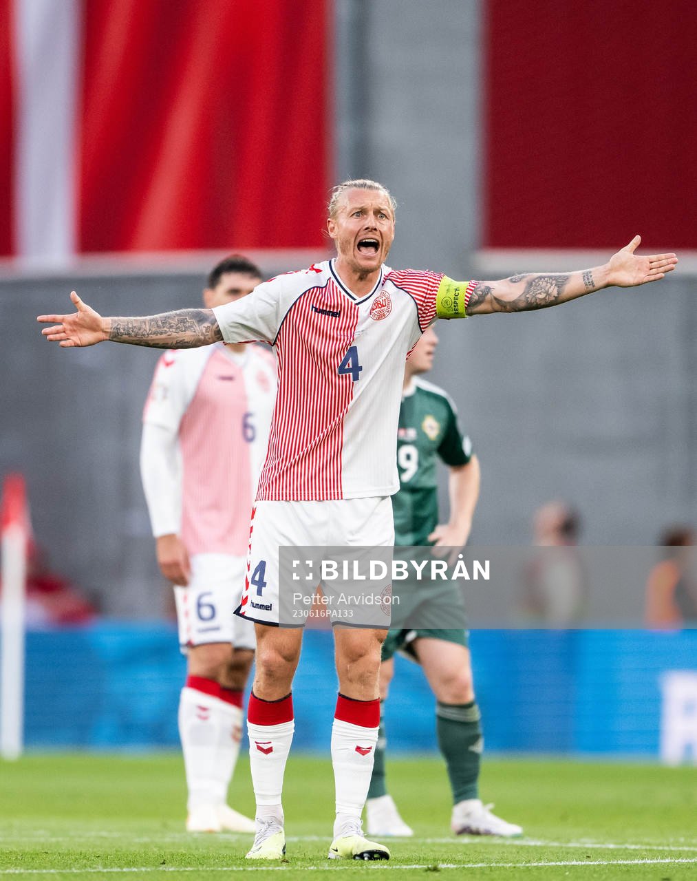 Simon Kjær of Denmark reacts