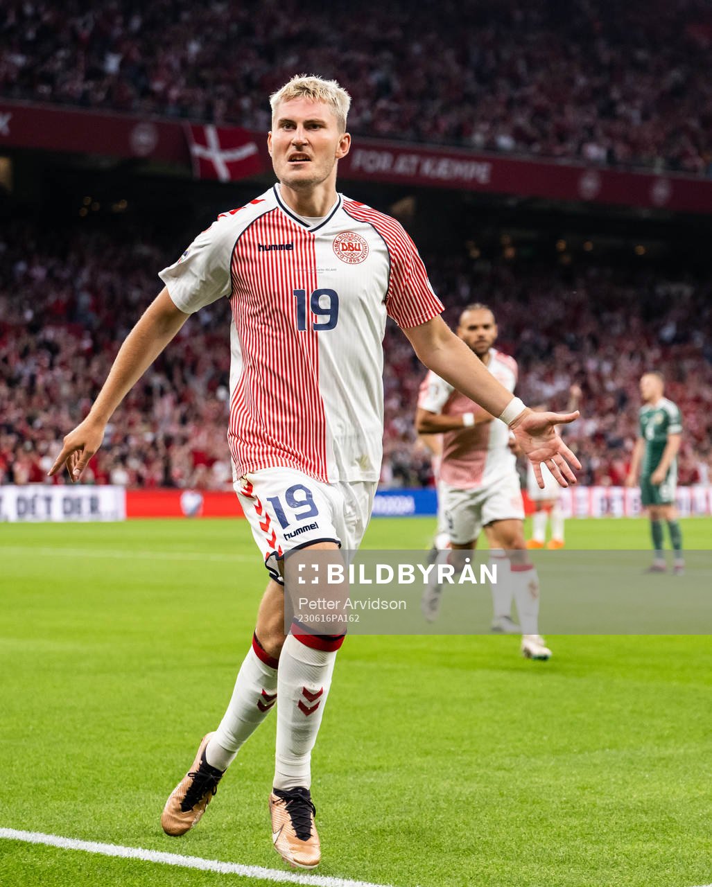 Jonas Wind of Denmark celebrates