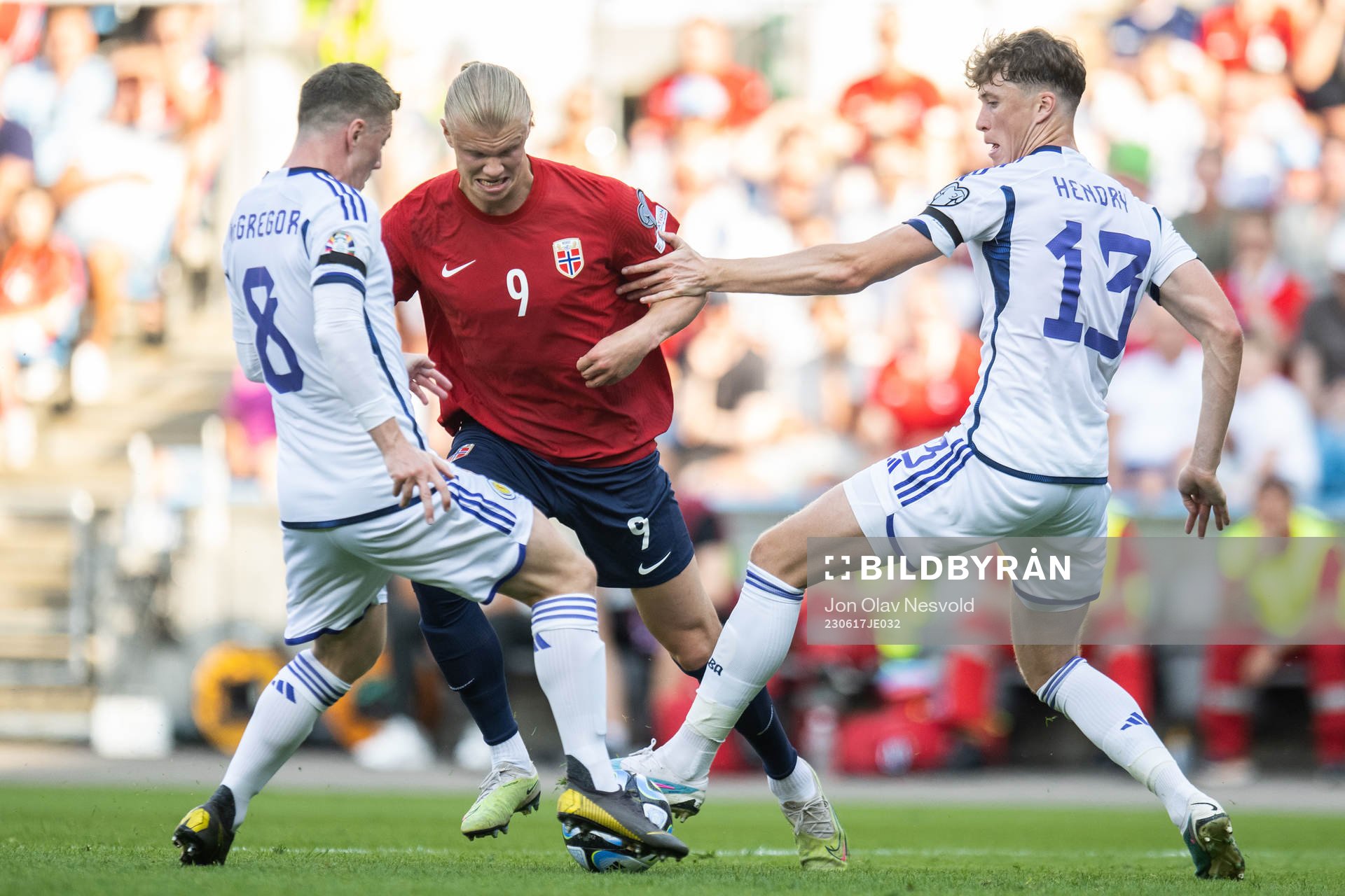 Callum McGregor and Jack Hendry of Scotland against Erling