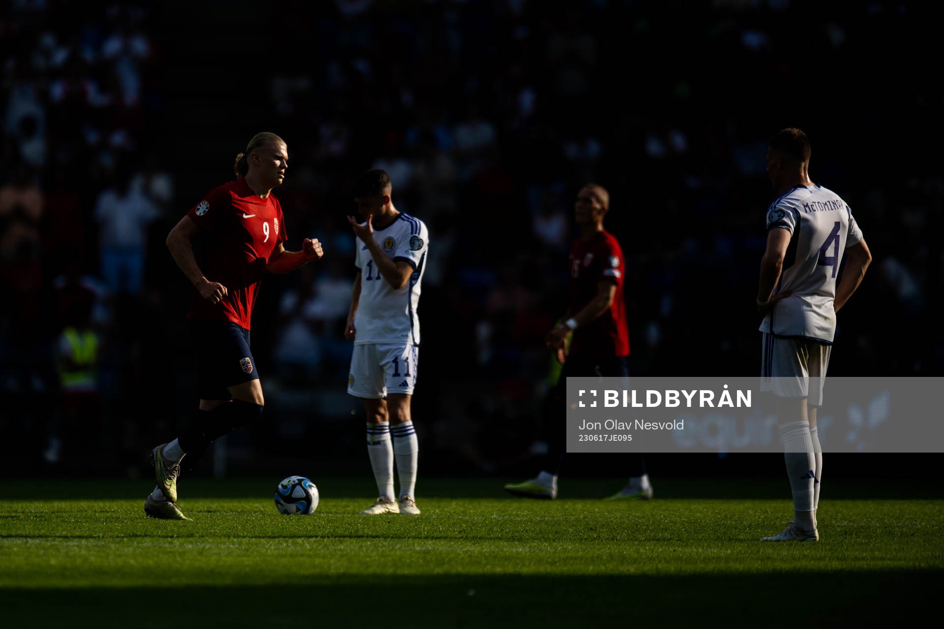 Erling Braut Haaland of Norway and Ryan Christie and Scott