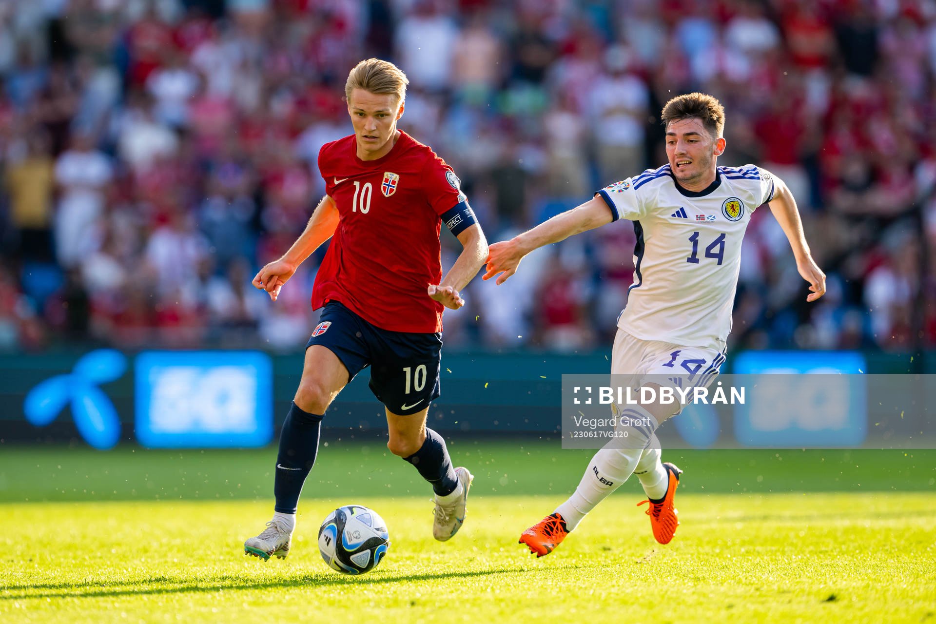 Martin Ødegaard of Norway and Billy Gilmour of Scotland