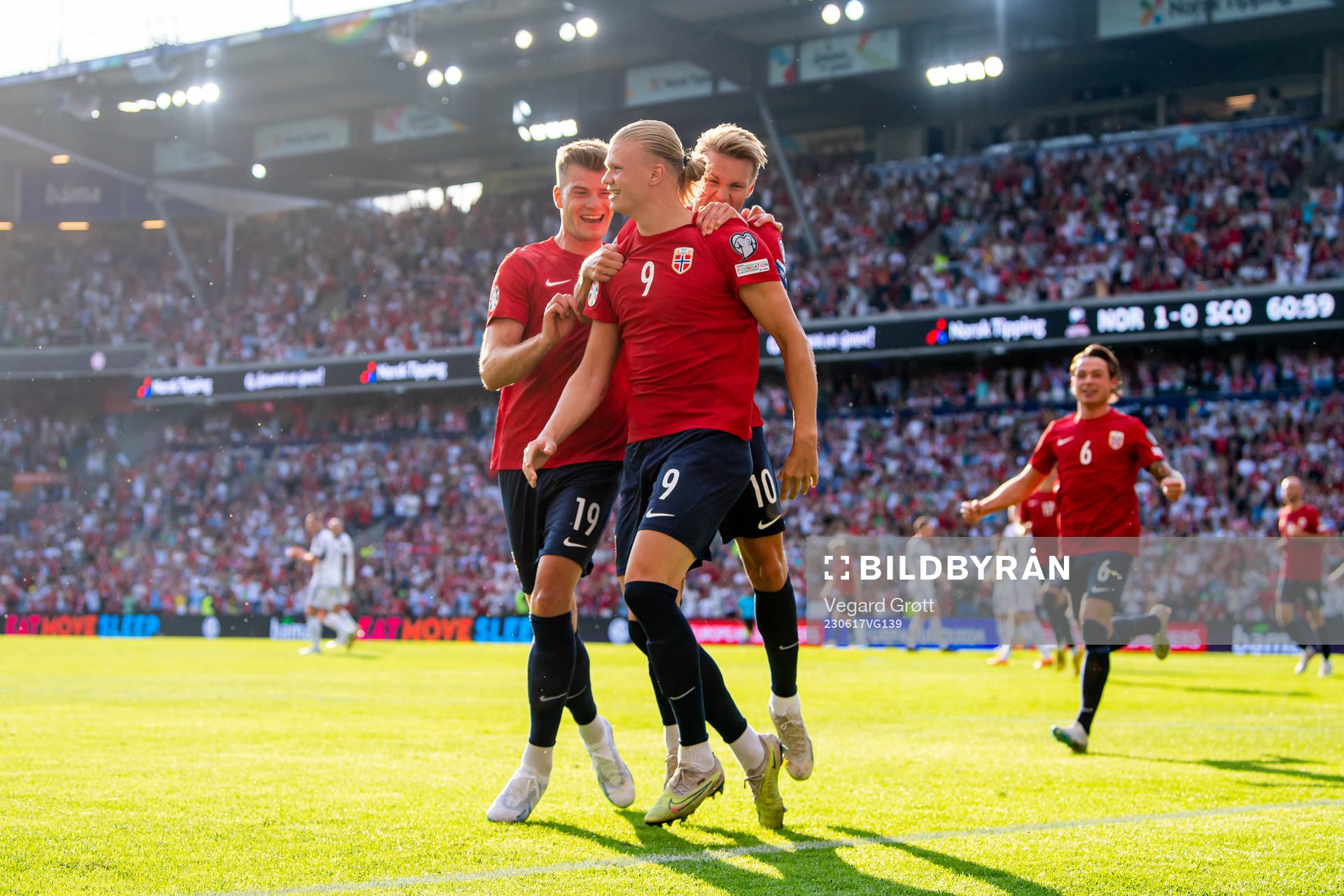 Erling Braut Haaland of Norway celebrates with teammates