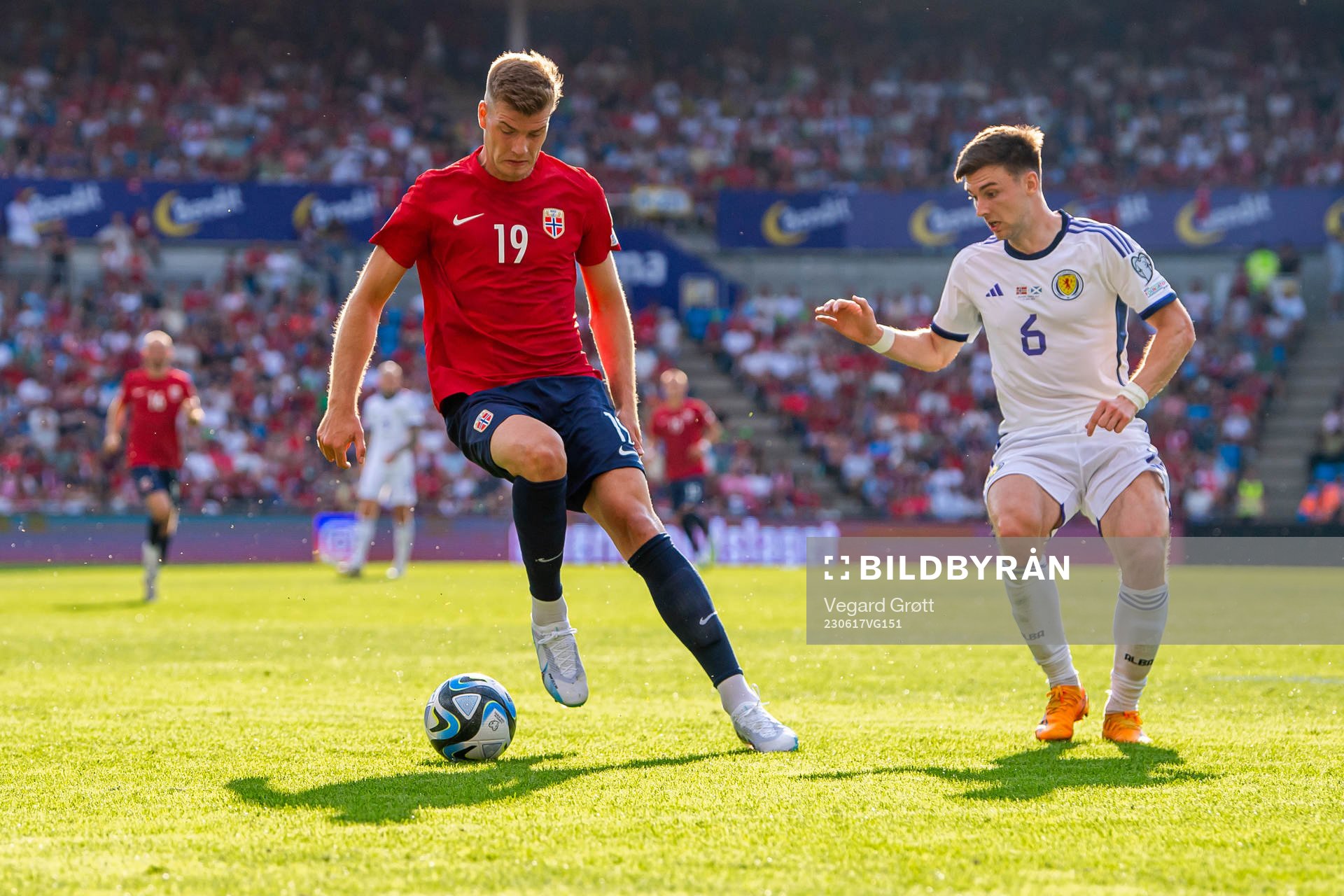 Alexander Sørloth of Norway and Kieran Tierney of Scotland