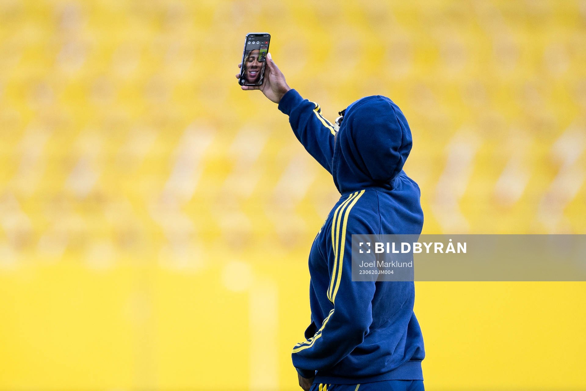 Anthony Elanga of Sweden facetiming with his girlfriend China Navana ahead of the UEFA Euro Qualifier football match between Austria and Sweden on June 20, 2023 in Vienna.