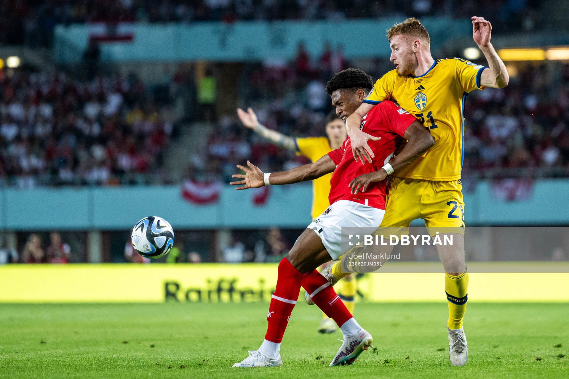 Junior Adamu of Austria and Dejan Kulusevski of Sweden during the UEFA Euro Qualifier football match between Austria and Sweden on June 20, 2023 in Vienna.
