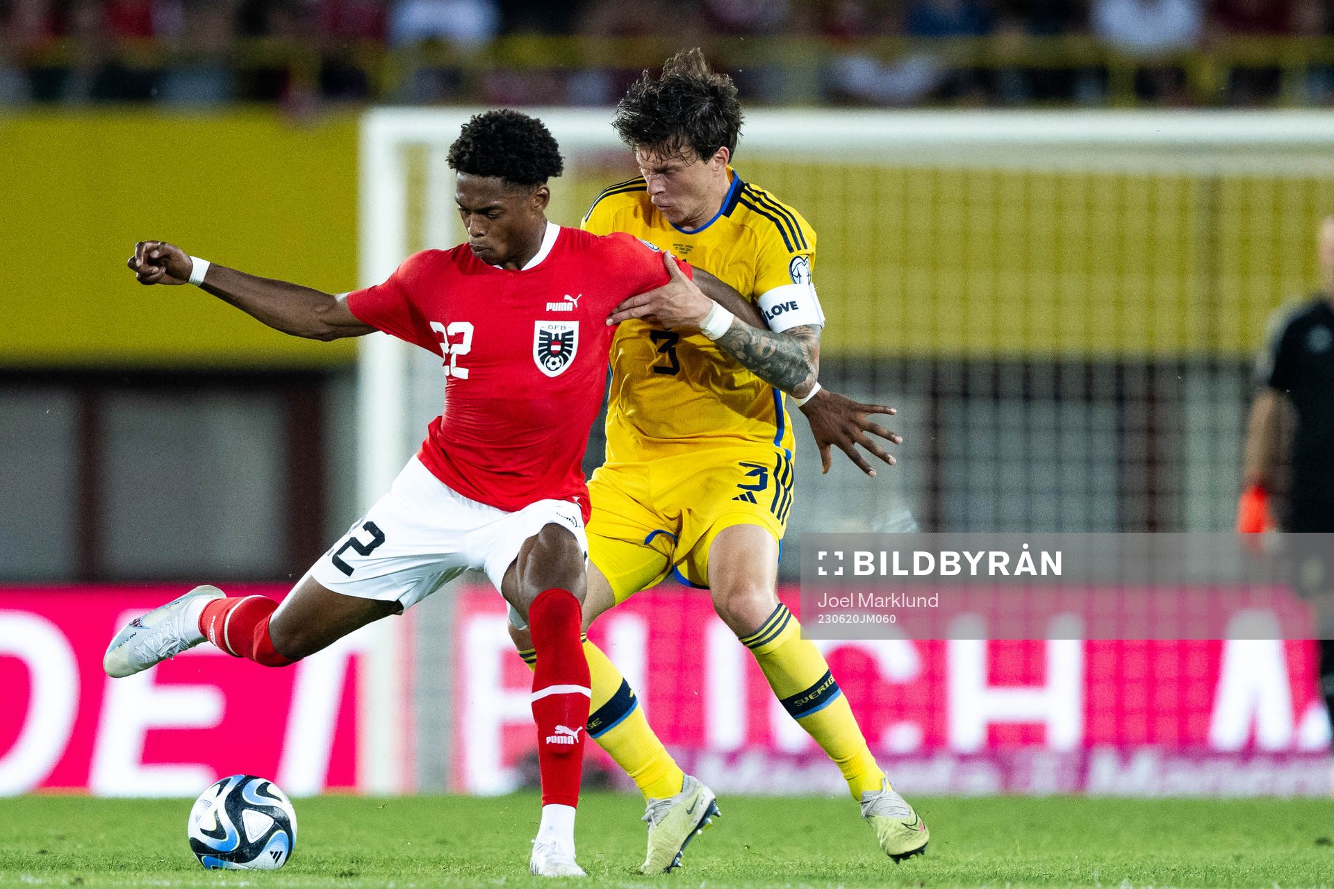 Junior Adamu of Austria and Victor Nilsson Lindelöf of Sweden during the UEFA Euro Qualifier football match between Austria and Sweden on June 20, 2023 in Vienna.