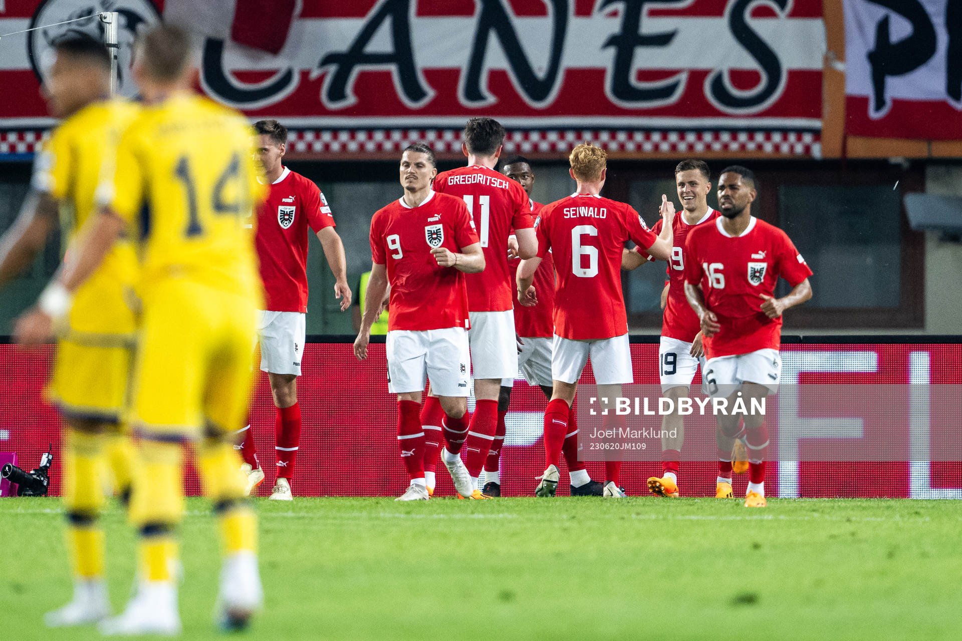 Christoph Baumgartner of Austria celebrates with team