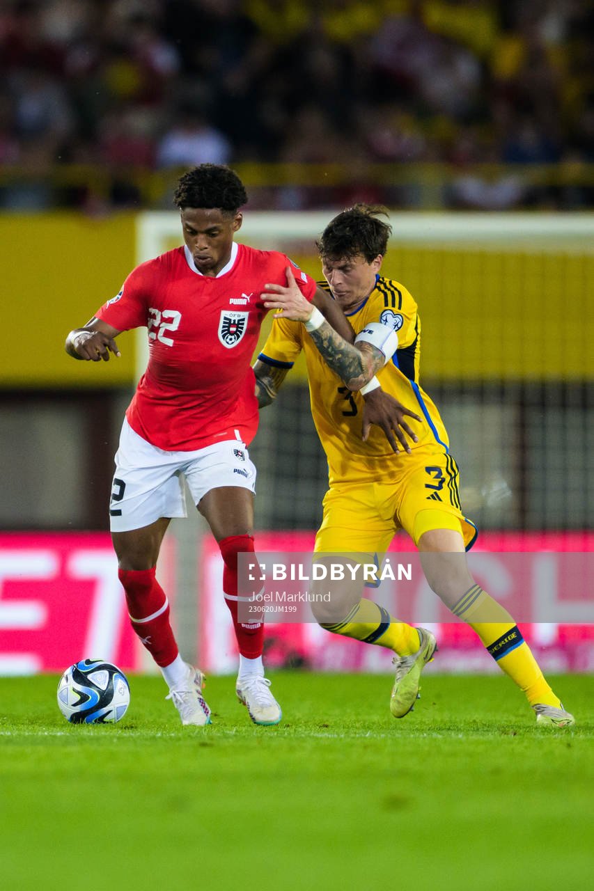 Junior Adamu of Austria and Victor Nilsson Lindelöf of Sweden during the UEFA Euro Qualifier football match between Austria and Sweden on June 20, 2023 in Vienna.