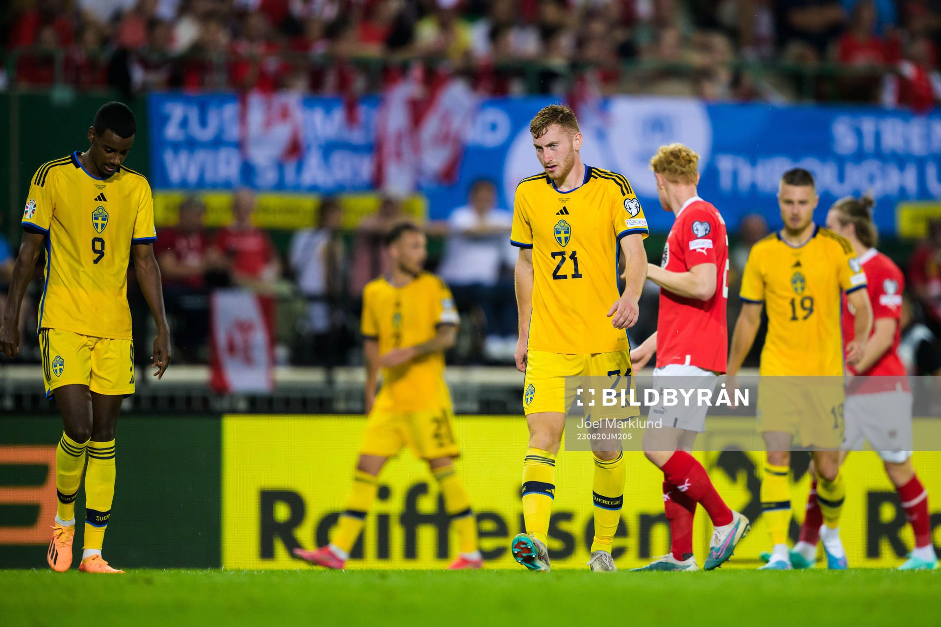Alexander Isak and Dejan Kulusevski of Sweden look dejected