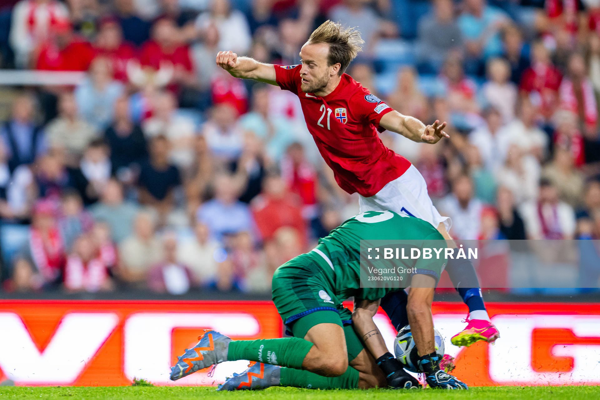 Bård Finne of Norway and goalkeeper Joel Mall of Cyprus