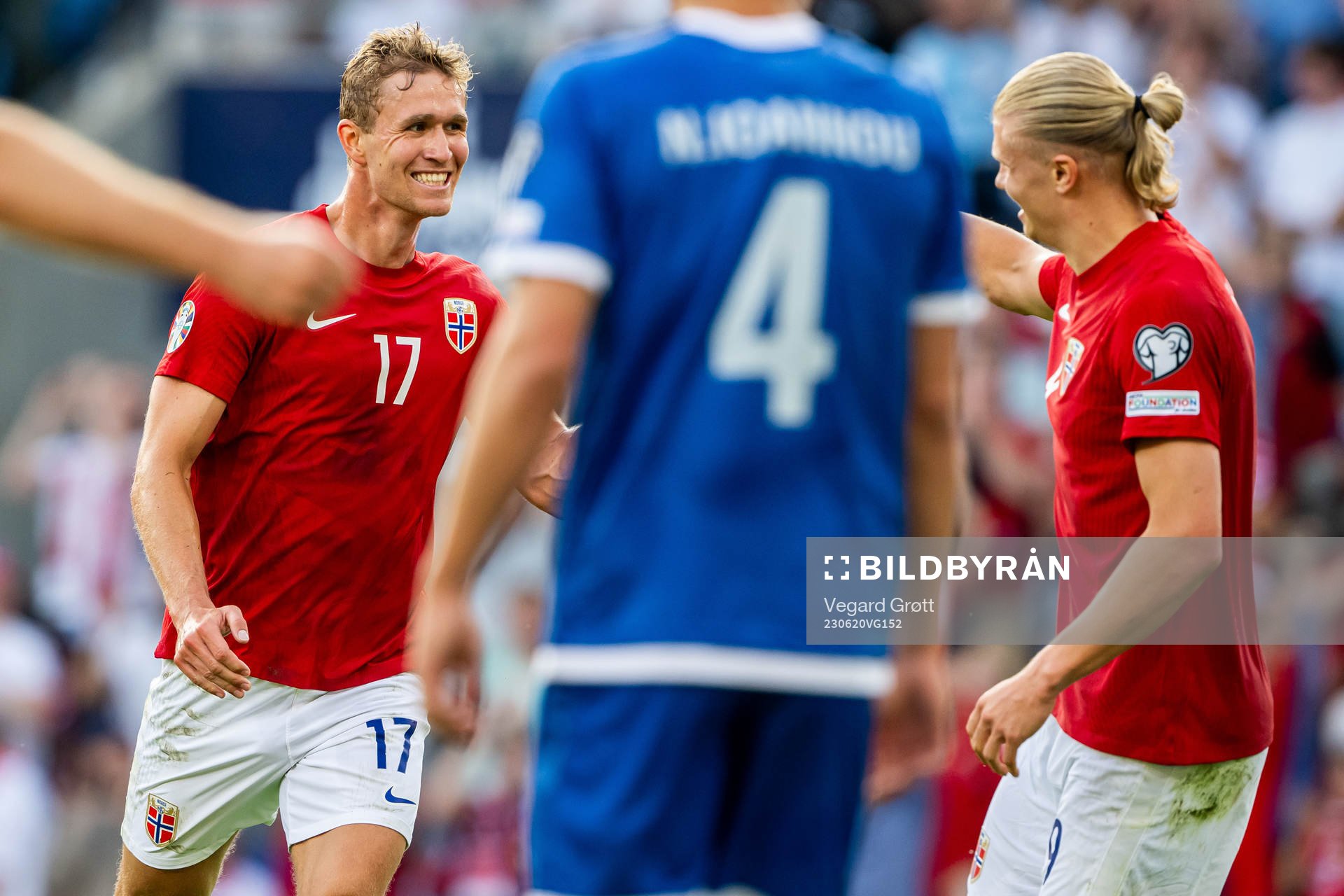 Ola Solbakken of Norway celebrates with Erling Braut Haaland