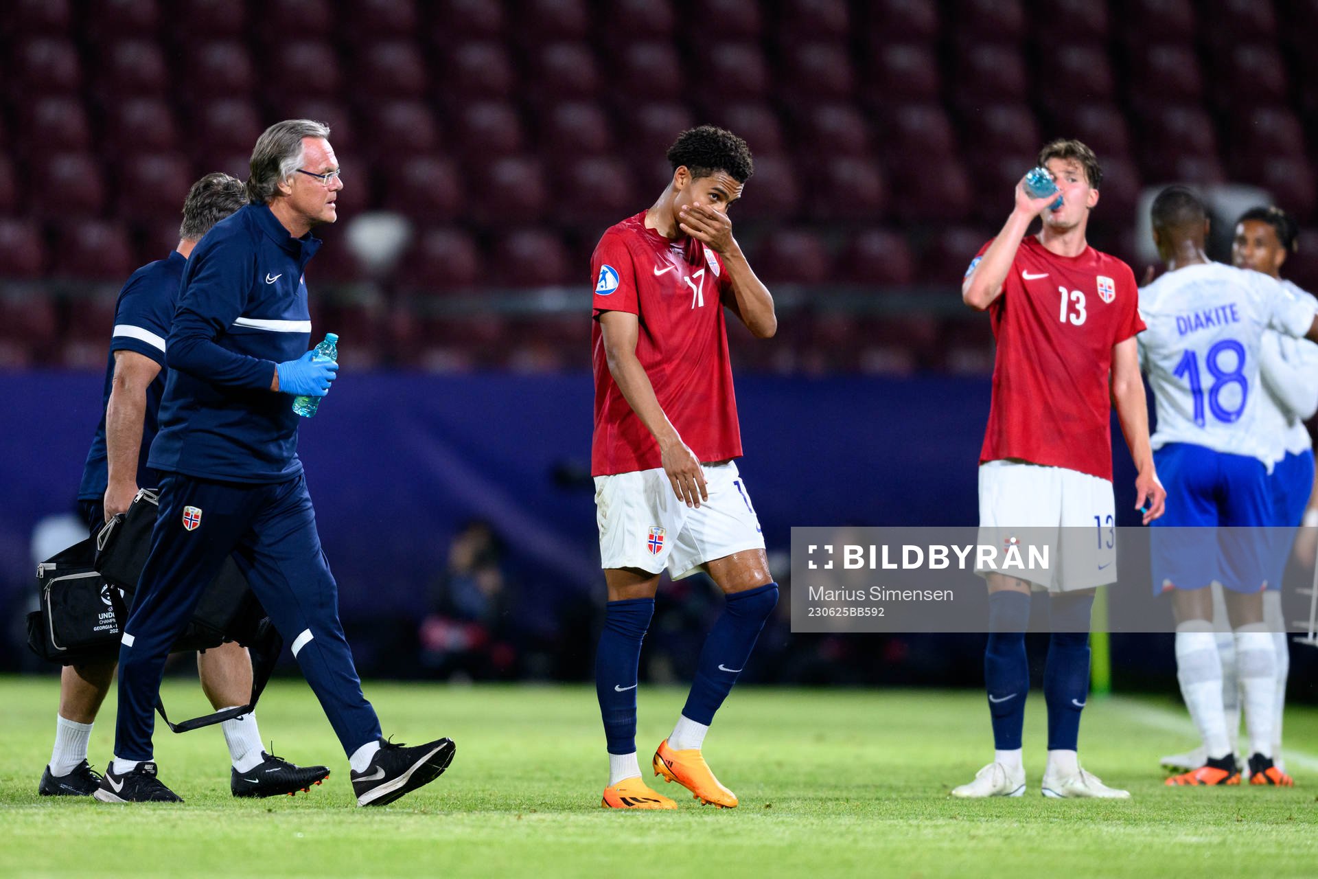 Antonio Nusa of Norway receives medical attention