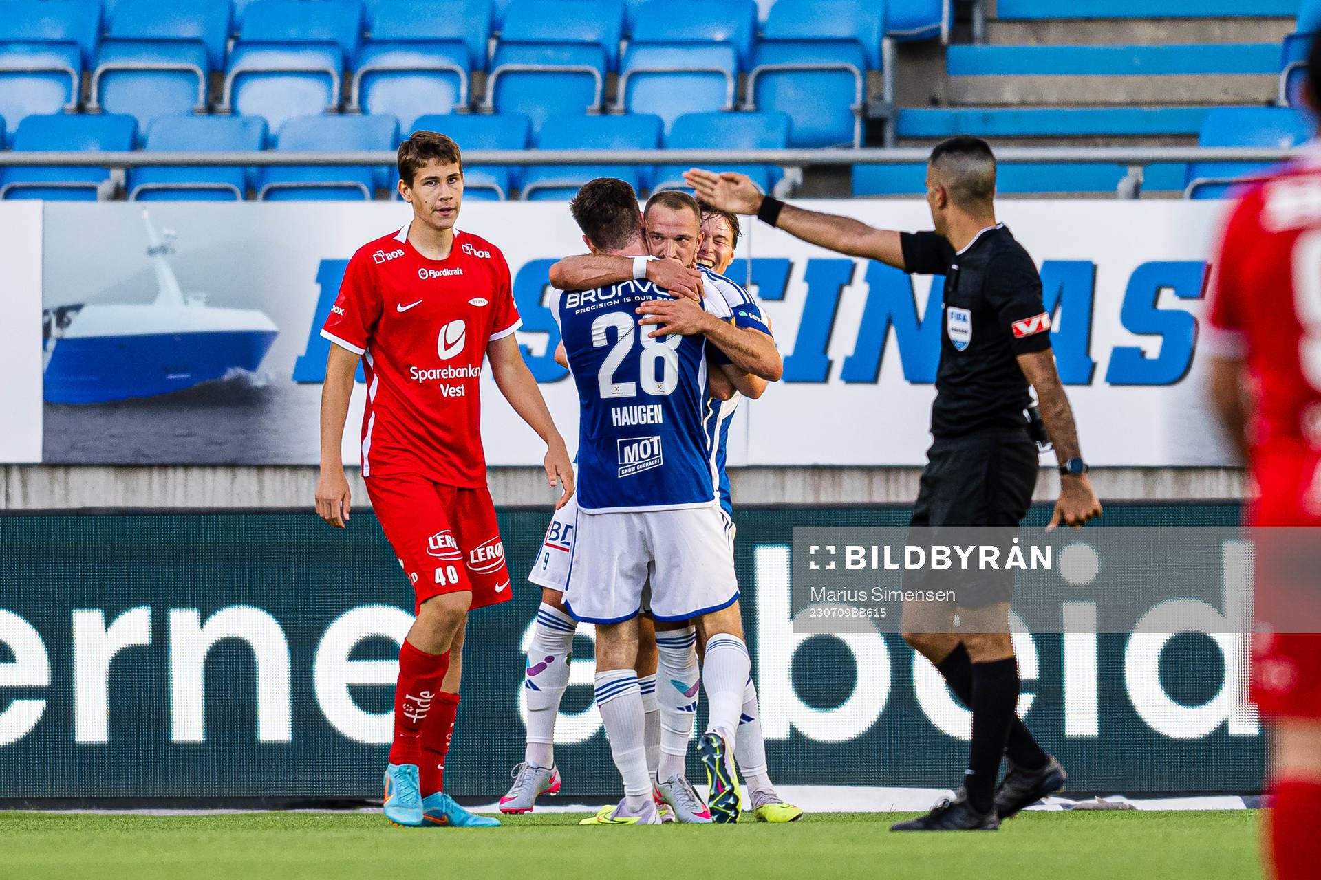 Eivind Fauske Helland of Brann looks dejected while Veton