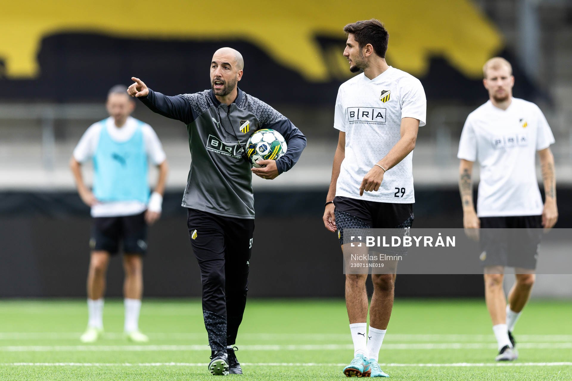 Assistant coach Martin Foyston and Filip Trpcevski of