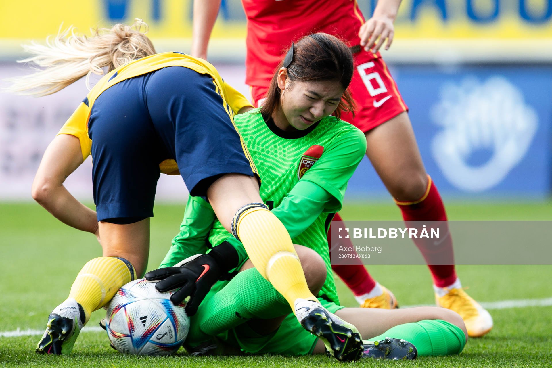 Agnes Nyberg of Sweden and goalkeeper Liu Chen of China