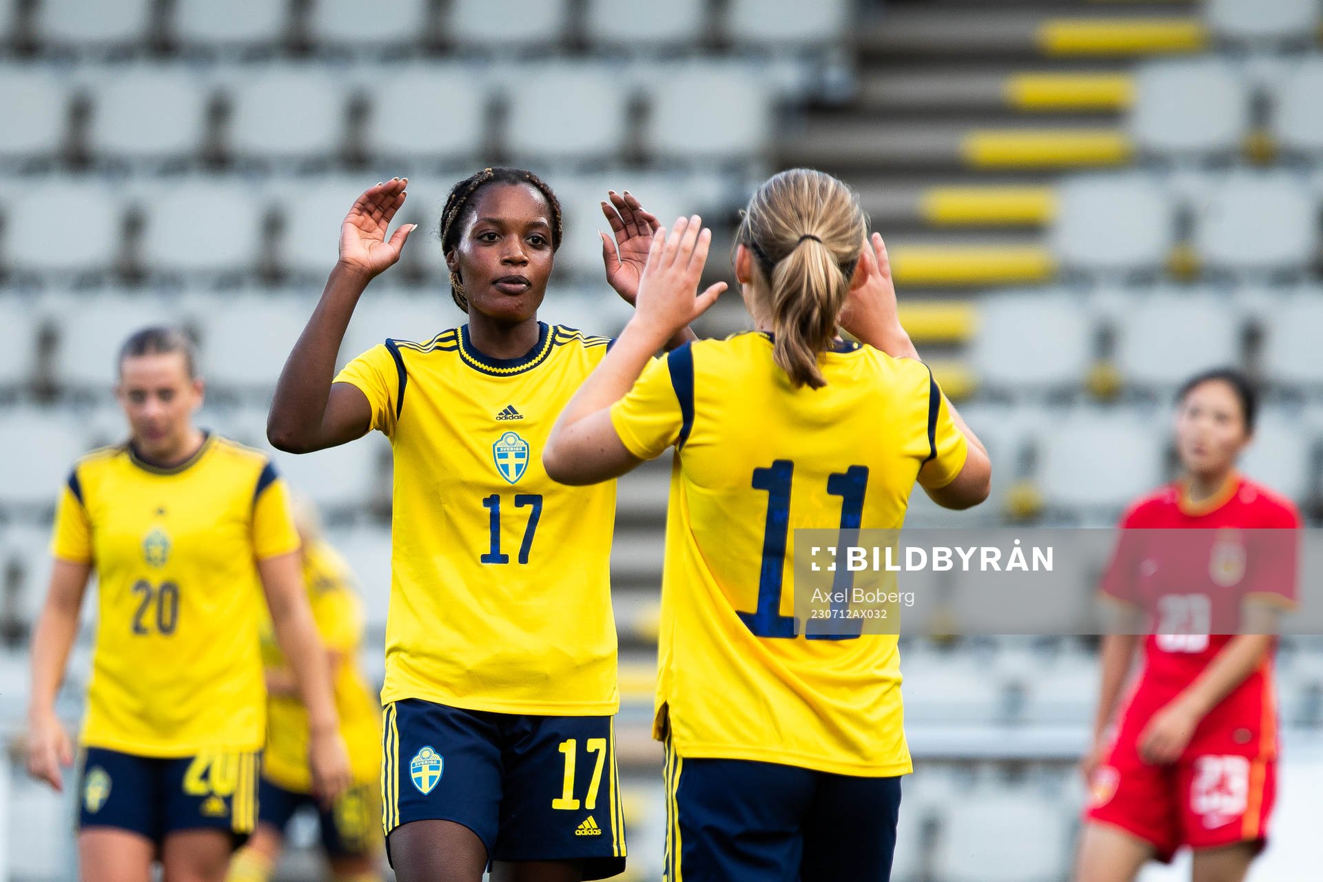 Evelyn Ijeh and Paulina Nyström of Sweden celebrate