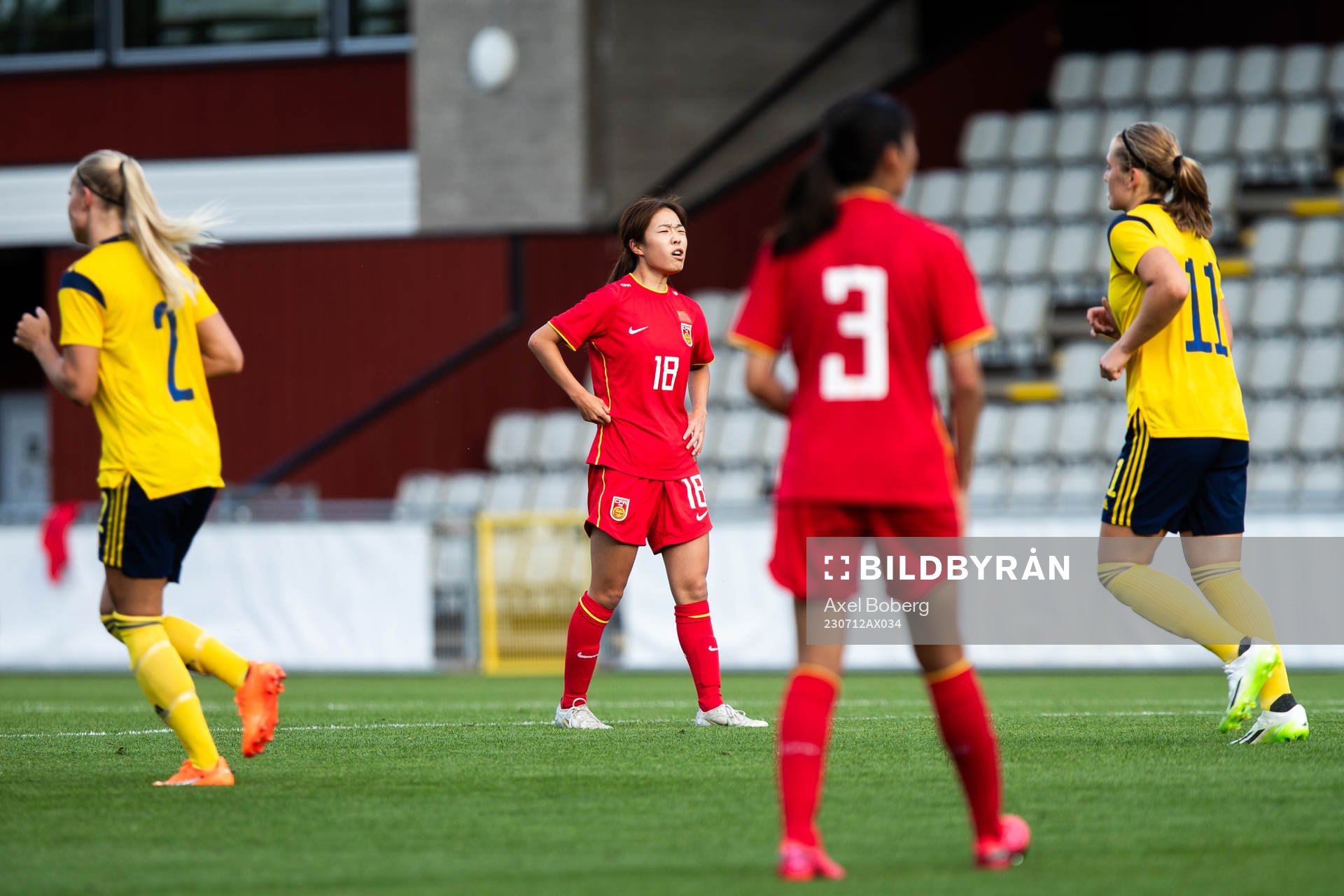 Chenxi Zhang of China looks dejected