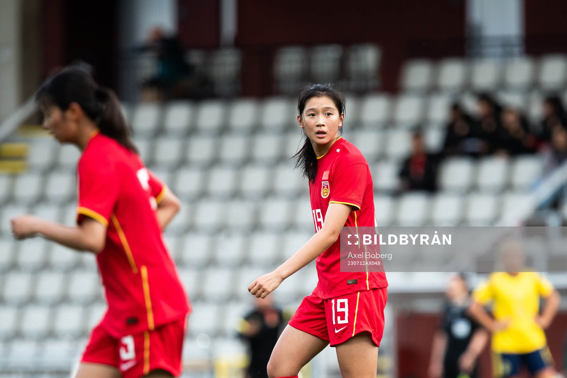 Jiayu Lu of China looks dejected