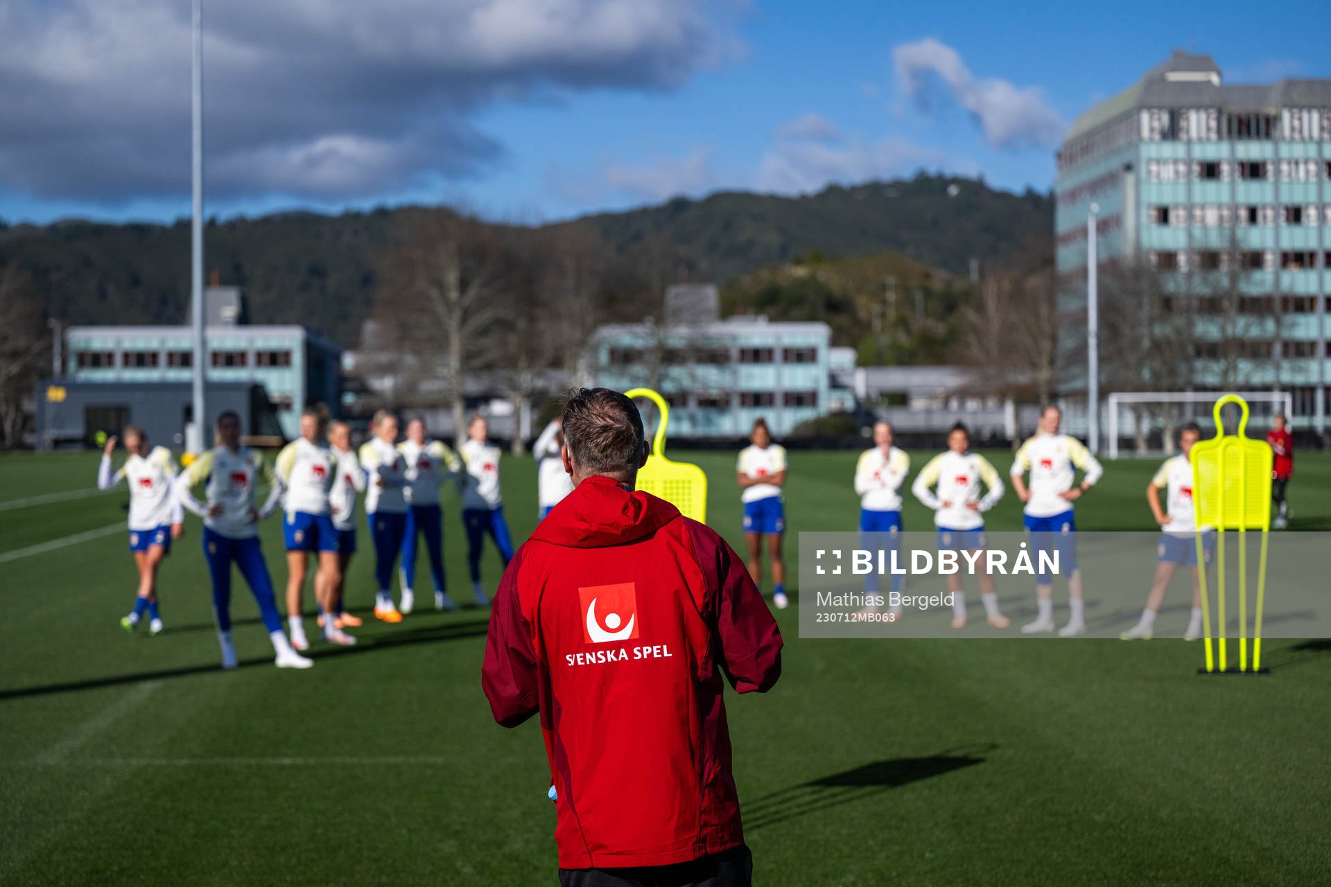 Head coach Peter Gerhardsson talks to players of the