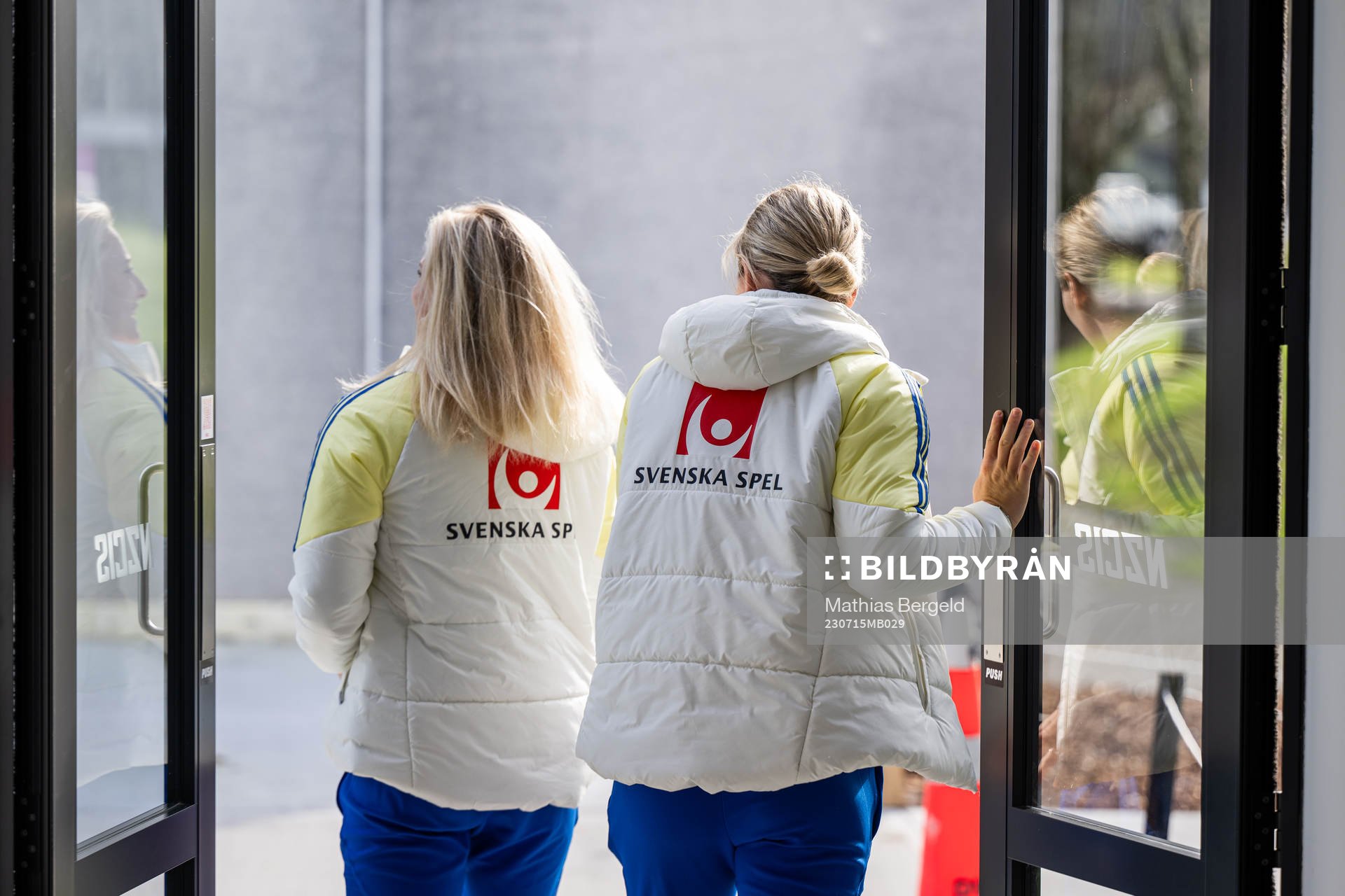 Rebecka Blomqvist and goalkeeper Jennifer Falk walks out a door during a tour of the Swedish women's national football teams base camp ahead of the FIFA Women's World Cup on July 15, 2023 in Upper Hutt.
