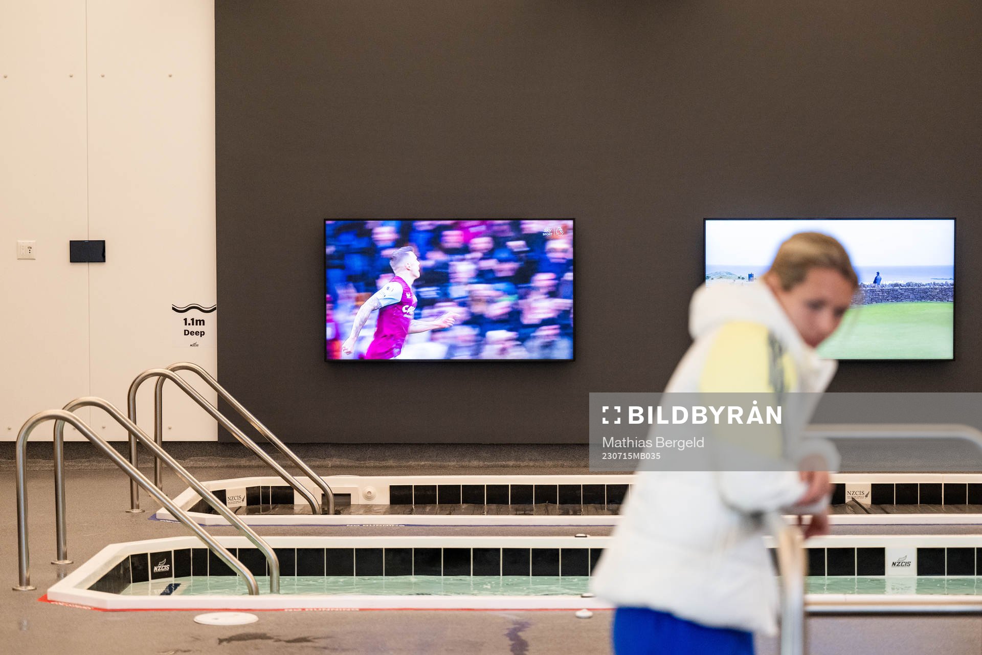 Pools and TVs is seen behind goalkeeper Jennifer Falk in the pool area during a tour of the Swedish women's national football teams base camp ahead of the FIFA Women's World Cup on July 15, 2023 in Upper Hutt.
