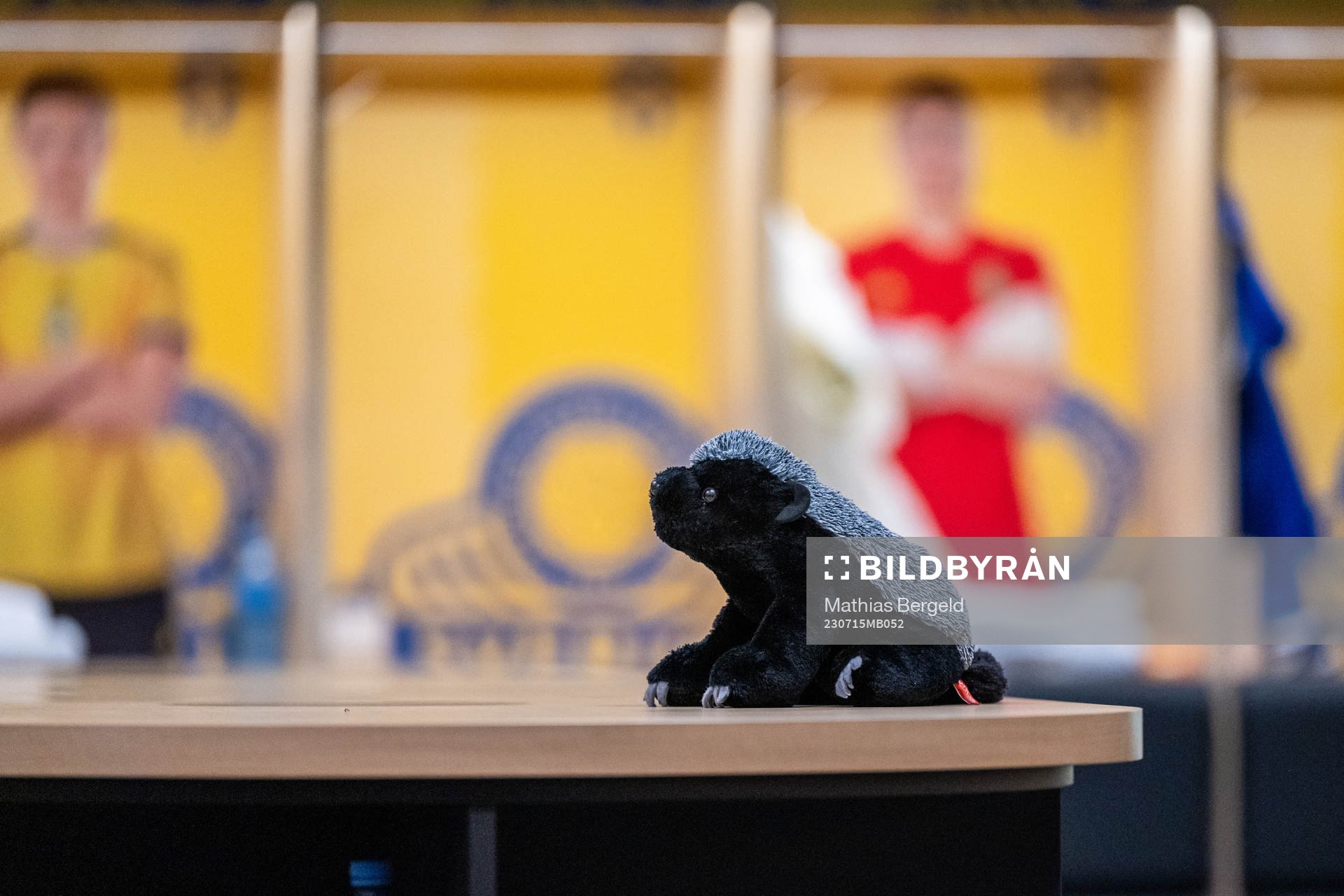 A stuffed animal in the form of a honey badger is seen in