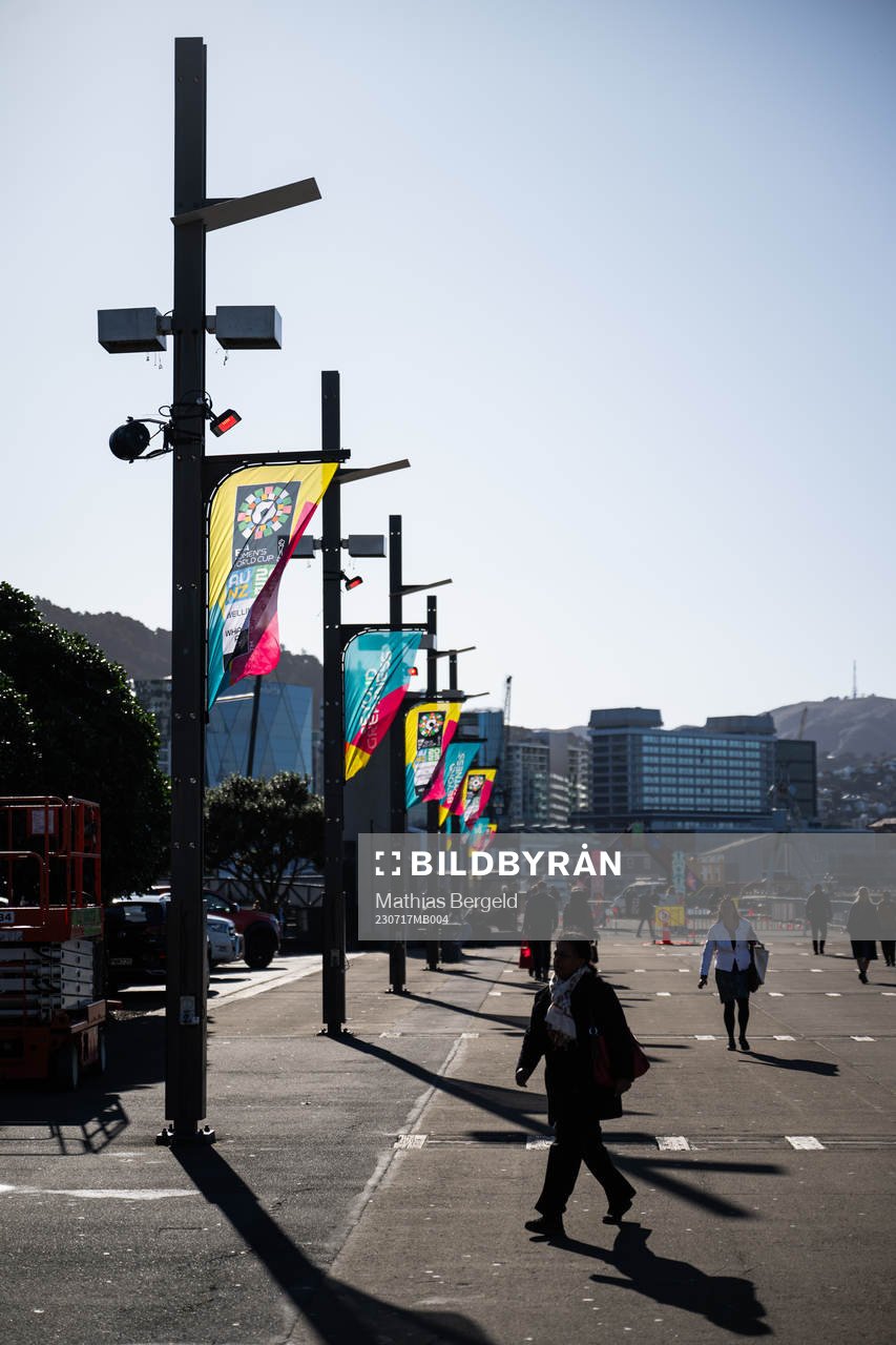 Banners for the FIFA Women's World Cup is seen among people