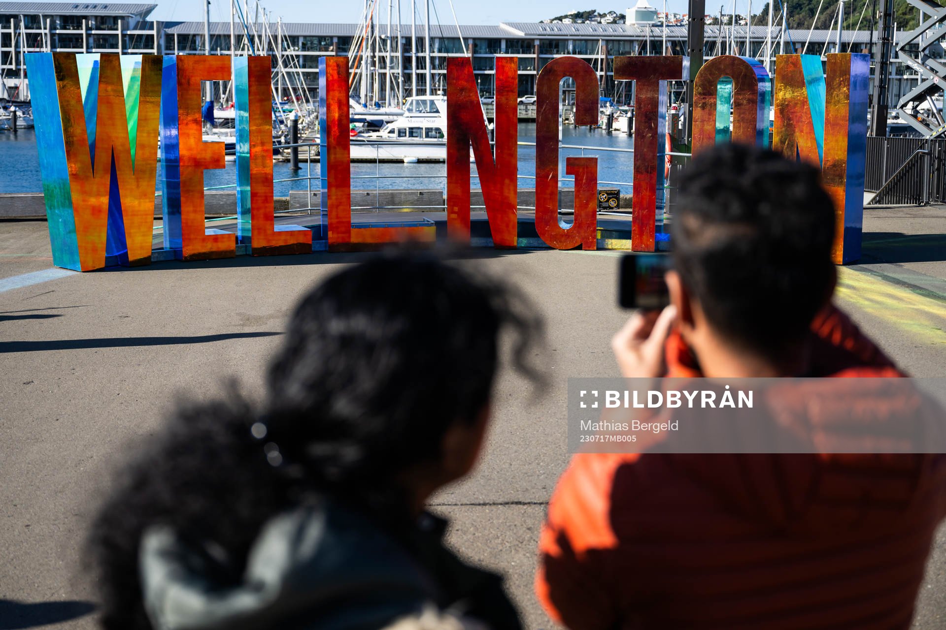 People photograph letters spelling ”Wellington”