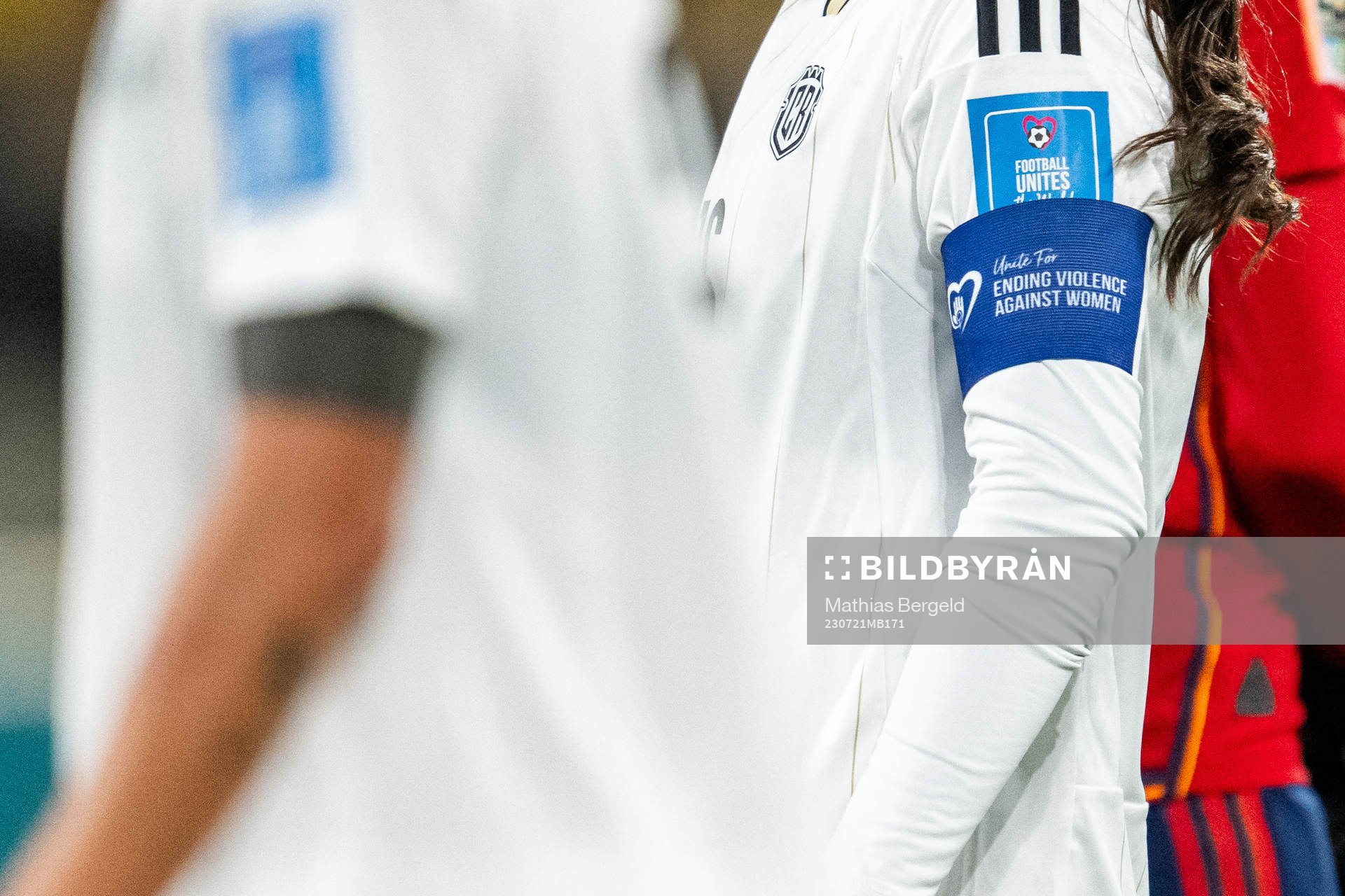 Katherine Alvarado with an armband with a text that reads