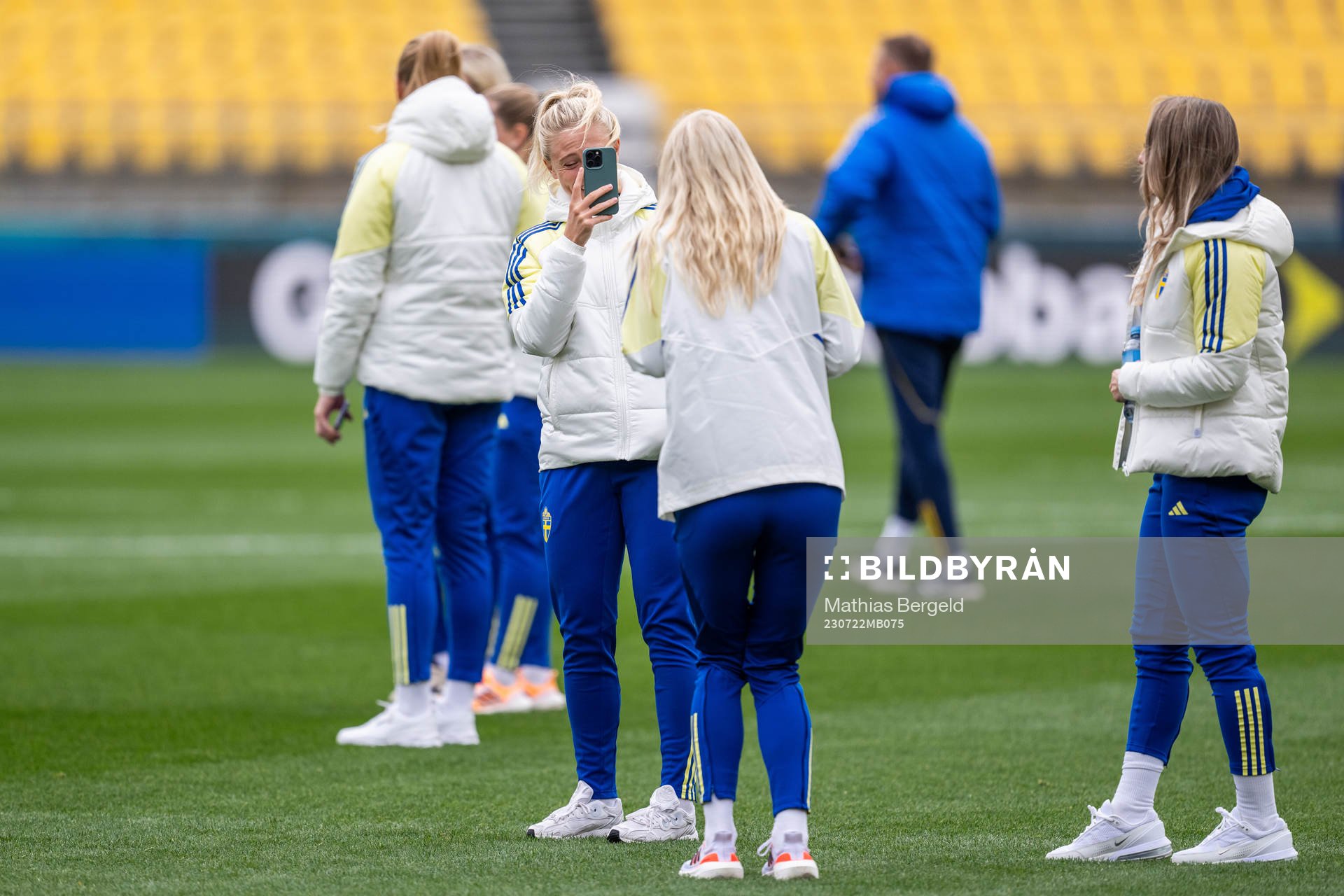 Rebecka Blomqvist takes a picture of Sofia Jakobsson of the