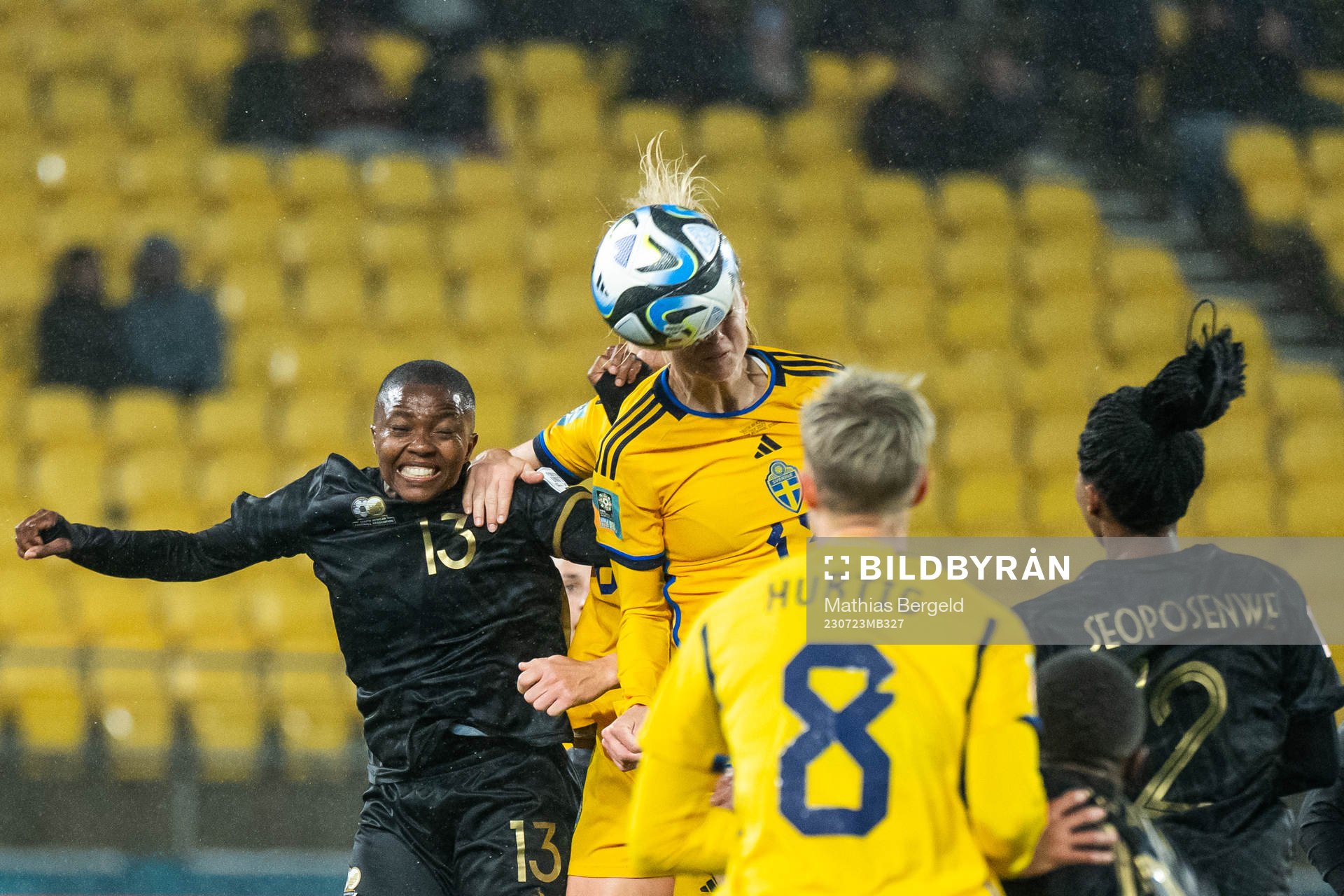 Bambanani Mbane of South Africa competes for the ball with