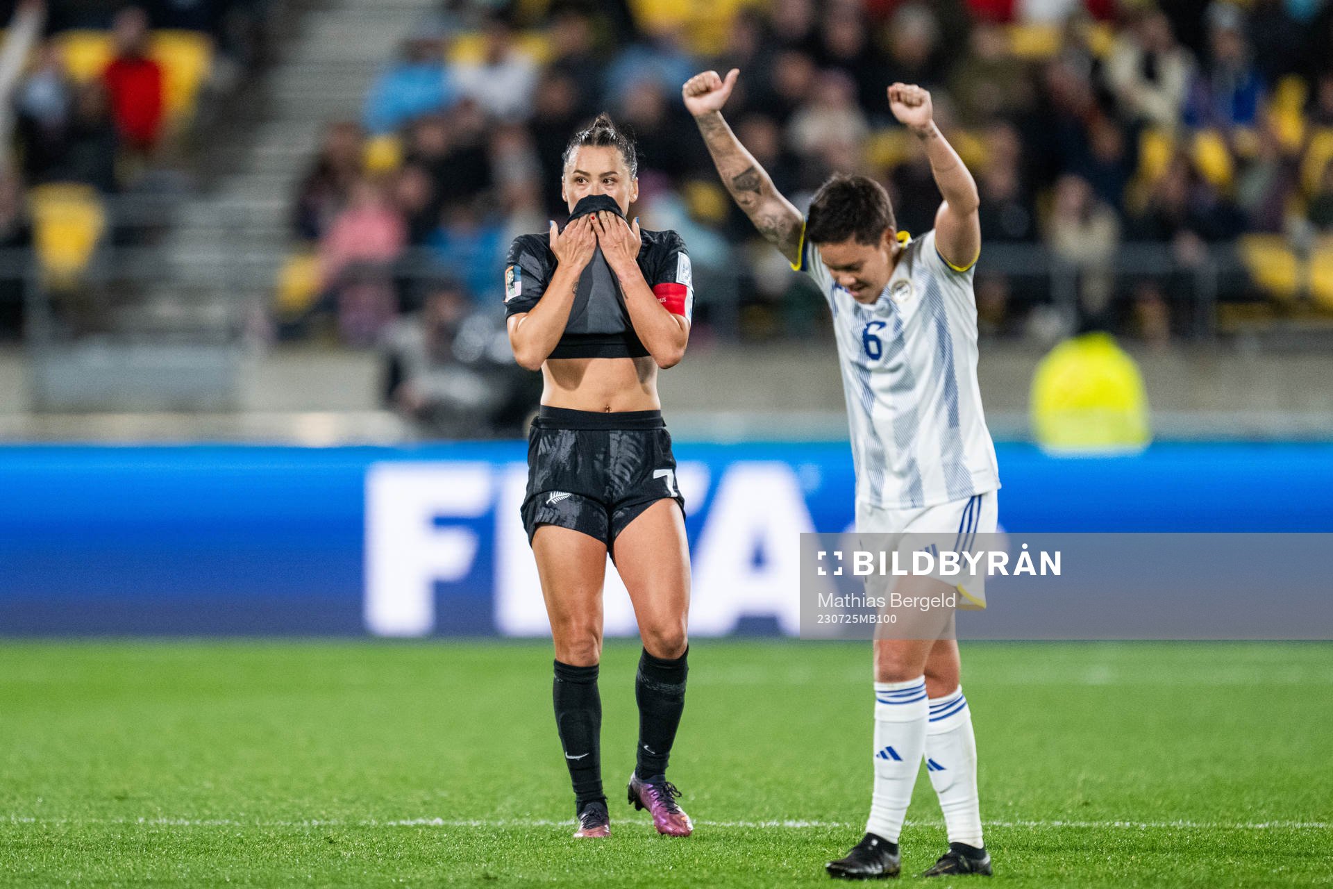 Ali Riley of New Zealand looks dejected while Tahnai Annis