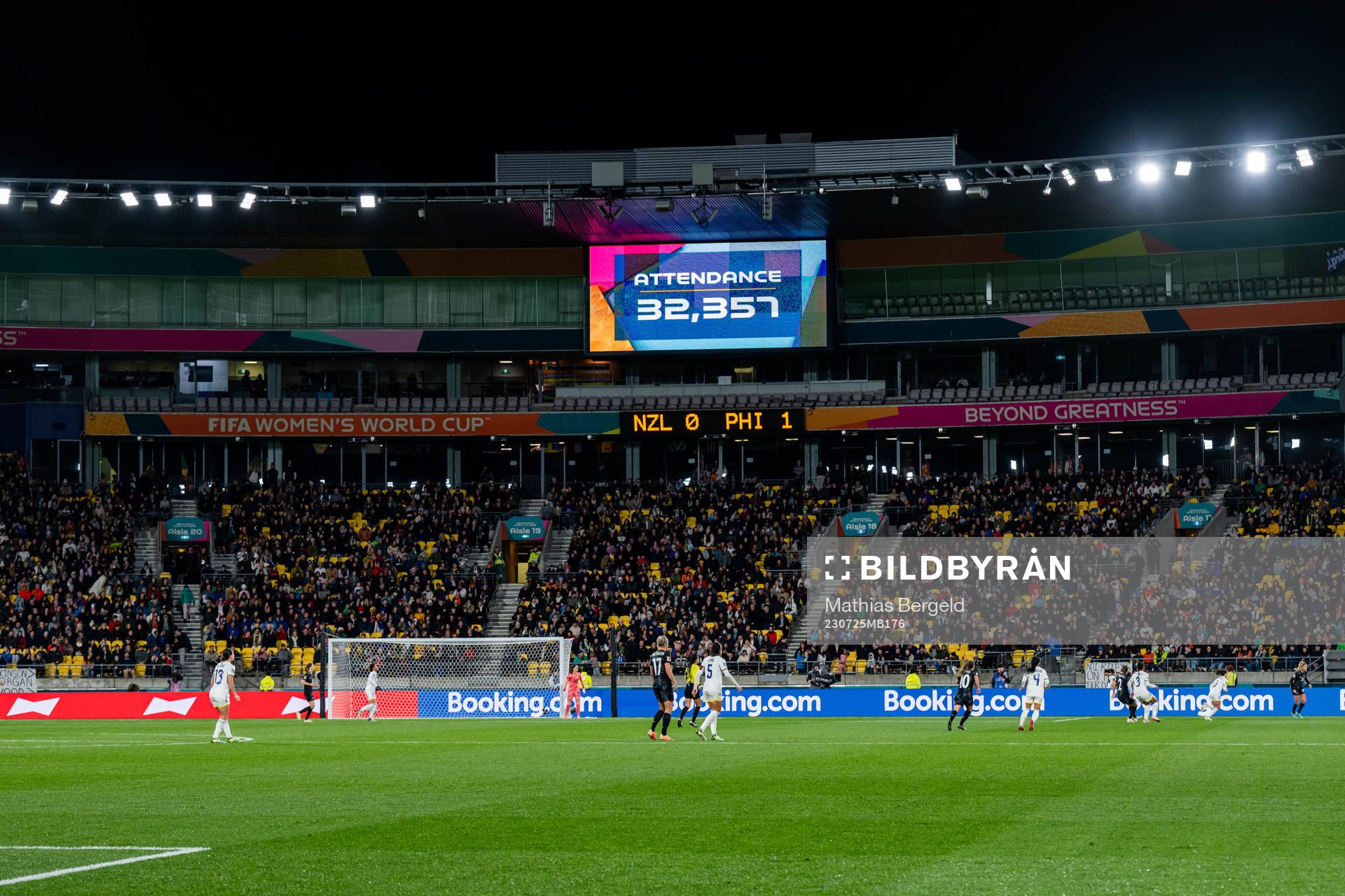 A screen shows the attendance of 32 357