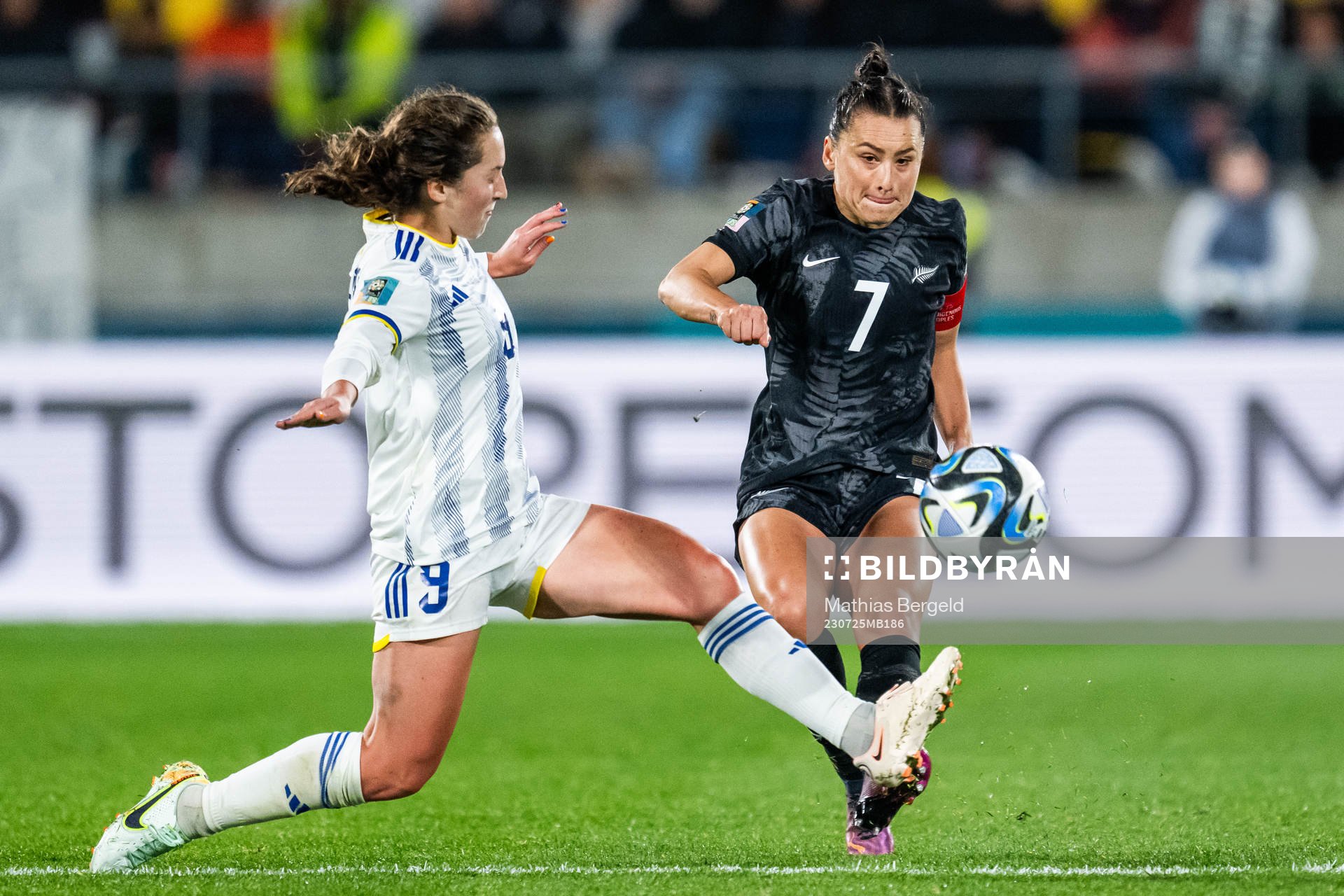 Isabella Flanigan of Philippines and Ali Riley of New Zealand during the FIFA Women's World Cup match between New Zealand and Philippines on July 25, 2023 in Wellington.