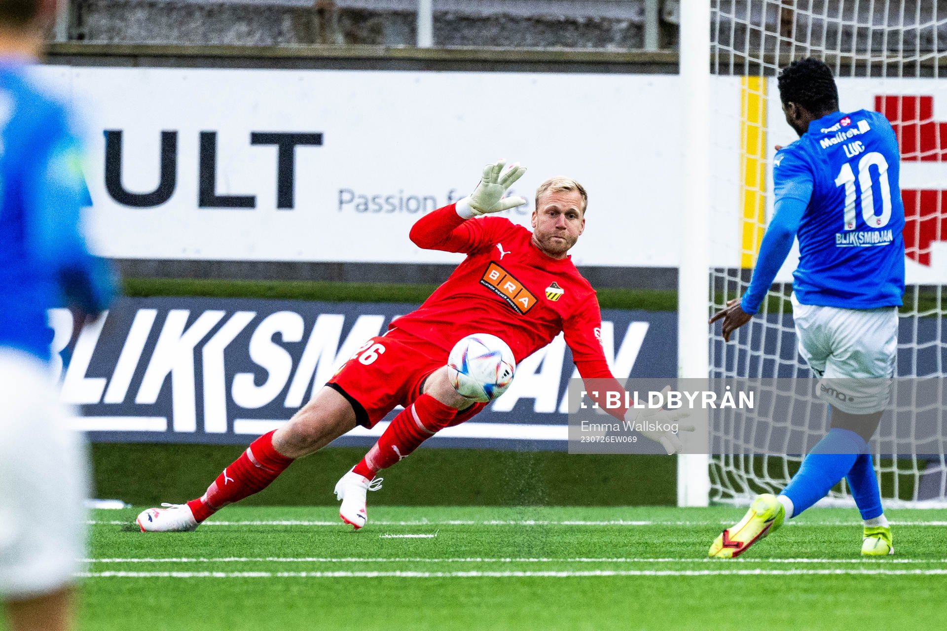 Goalkeeper Peter Abrahamsson of BK Häcken and Luc Kassi of