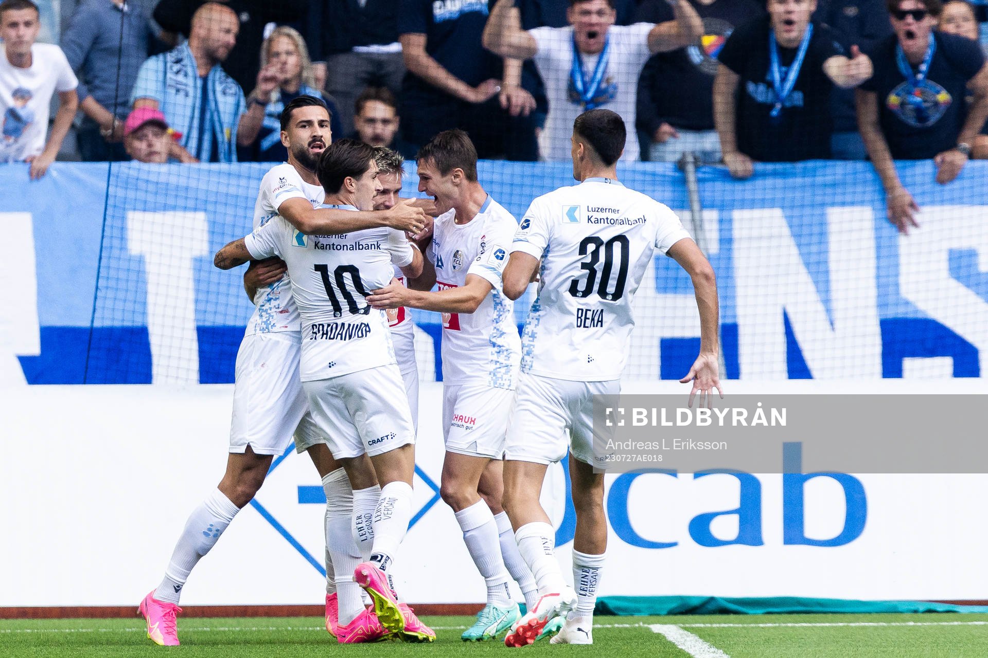 Kemal Ademi of Luzern celebrates with team
