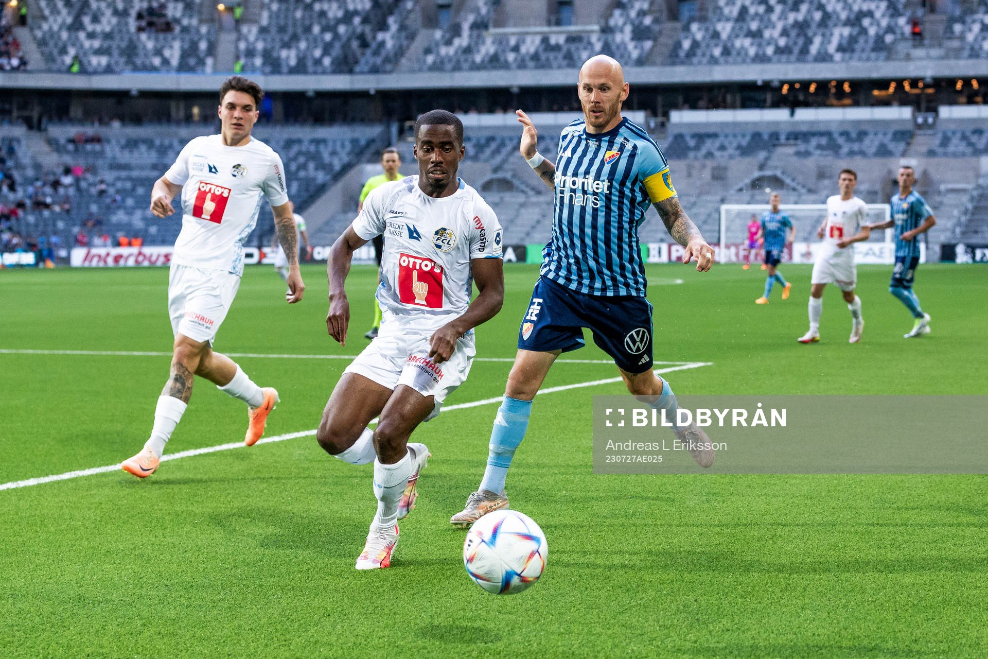 Teddy Okou of Luzern and Magnus Eriksson of Djurgården