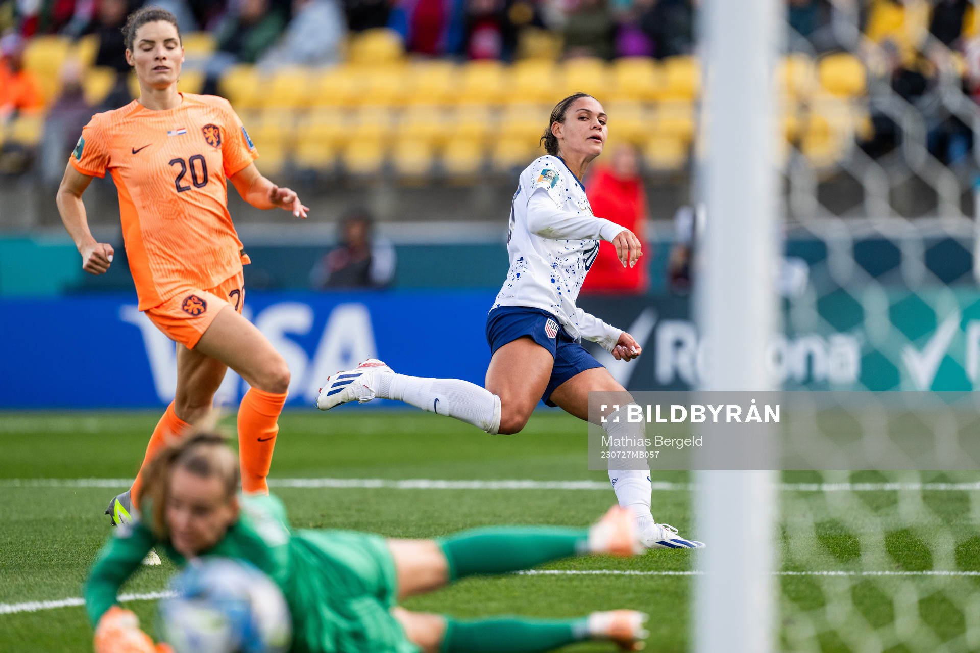 Dominique Janssen and goalkeeper Daphne van Domselaar of Netherlands see Trinity Rodman of USA shoot wide of the goal during the FIFA Women's World Cup football match between USA and Netherlands on July 27, 2023 in Wellington.